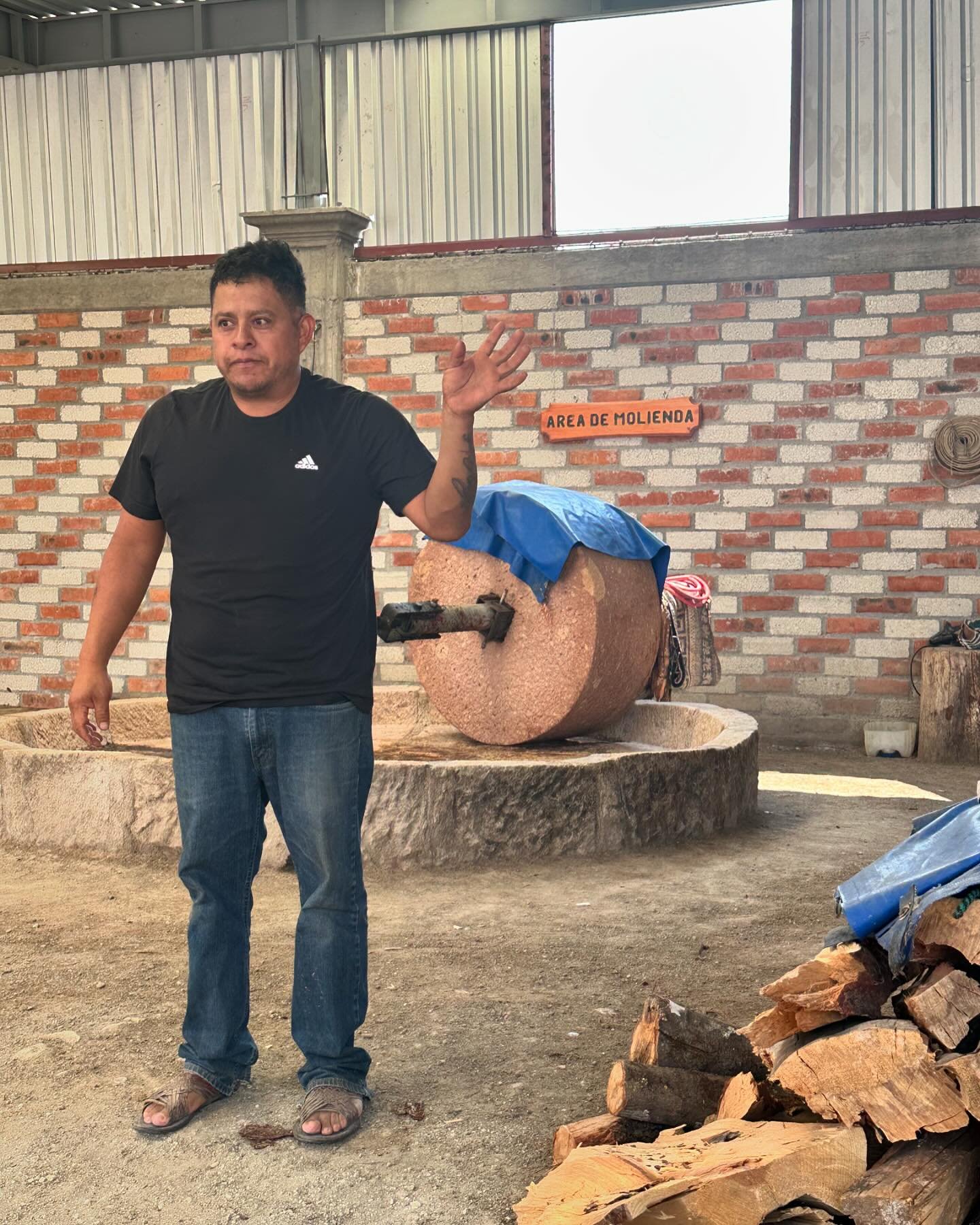 Mezcal Immersion. We stopped here because there was smoke billowing up from his compound.  He had just finished the fire roasting of the plant used to make mezcal, out the horse away, and was firing up his still.  Yes I  have a bottle to share.