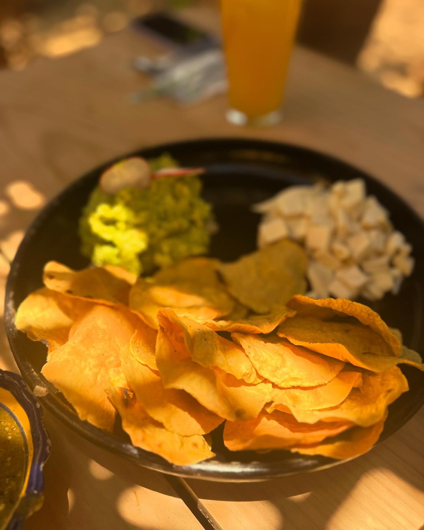 Chips, guacamole and salsa re defined.  Swept and mopped adobe floor, open air, truly farm to table, cicadas calling in the trees.