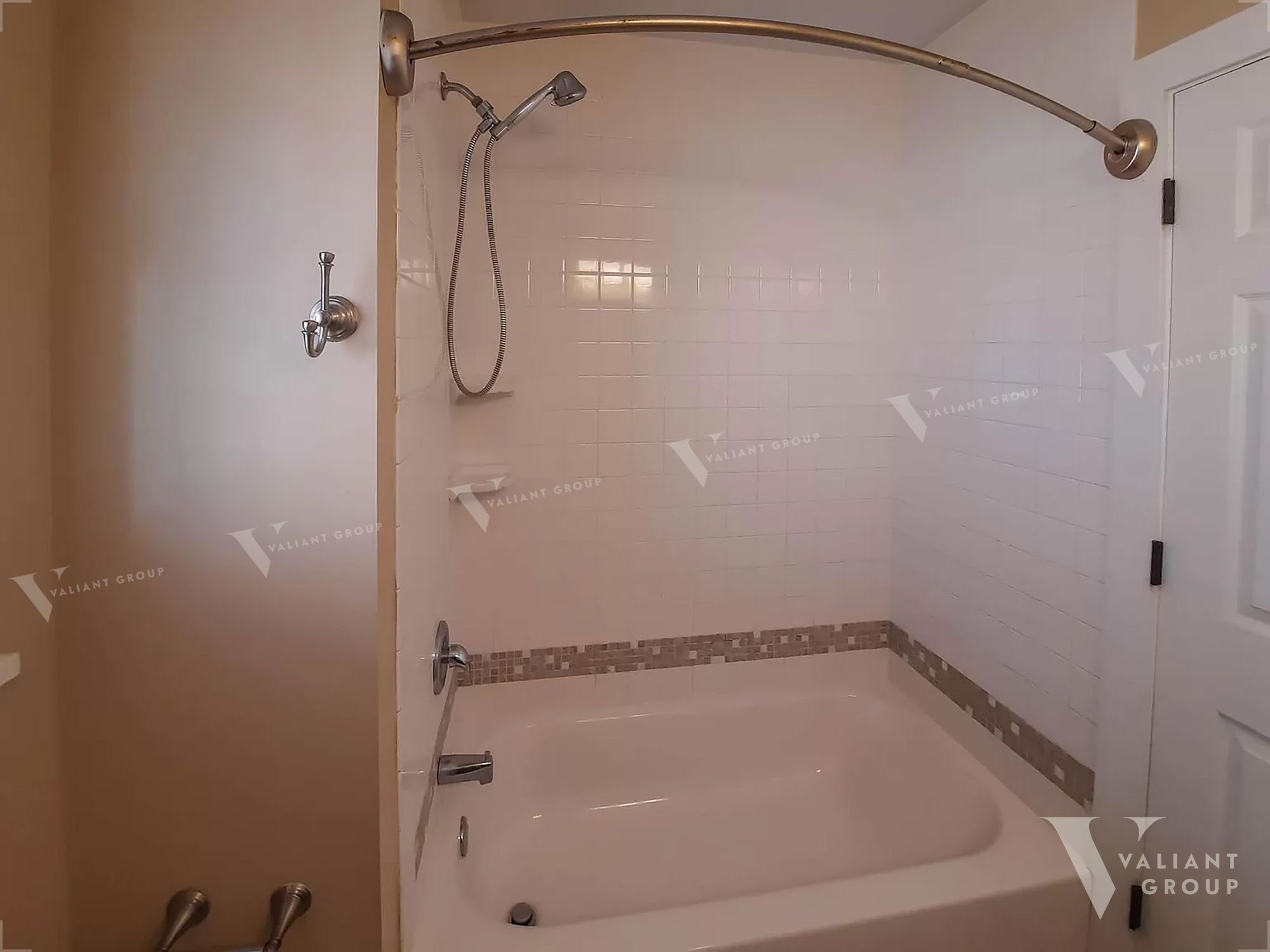 House for Rent Springfield MO - 710 E Locust  - shower and bath.jpg