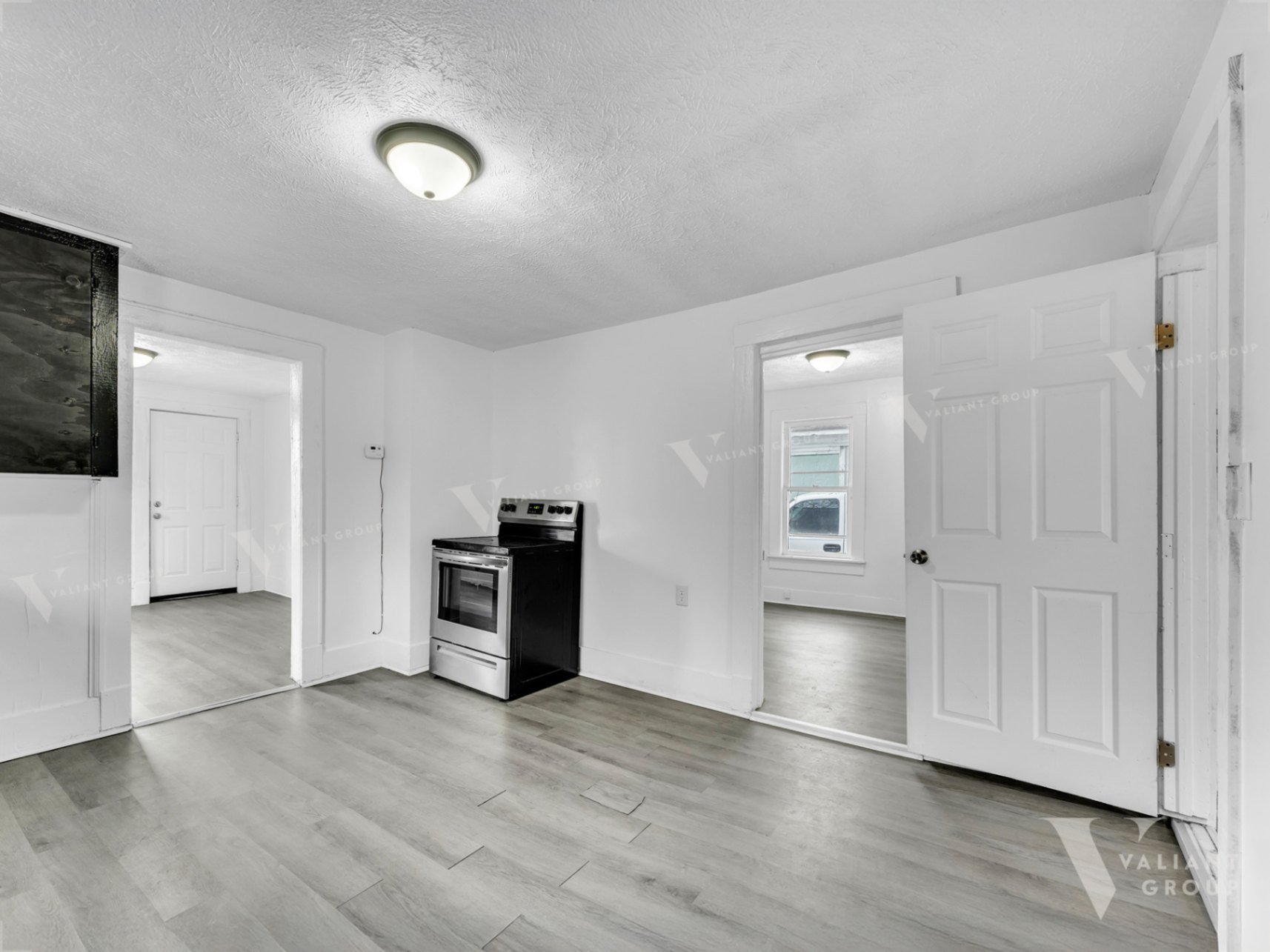 06--2100-W-Lee-St-Springfield-kitchen-into-bedroom.jpg