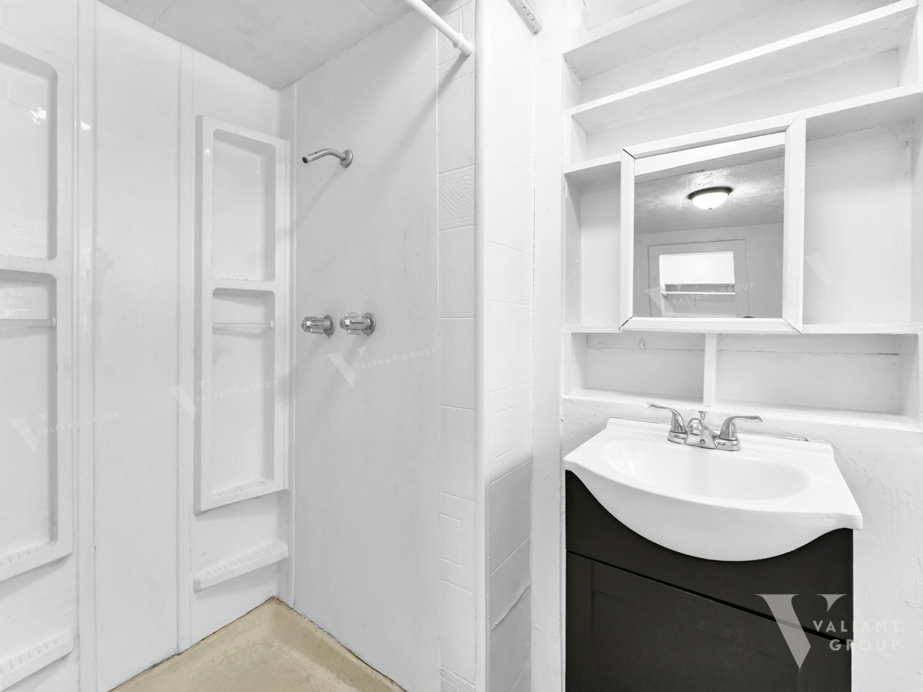 12--2100-W-Lee-St-Springfield-bathroom-sink-walk-in-shower.jpg