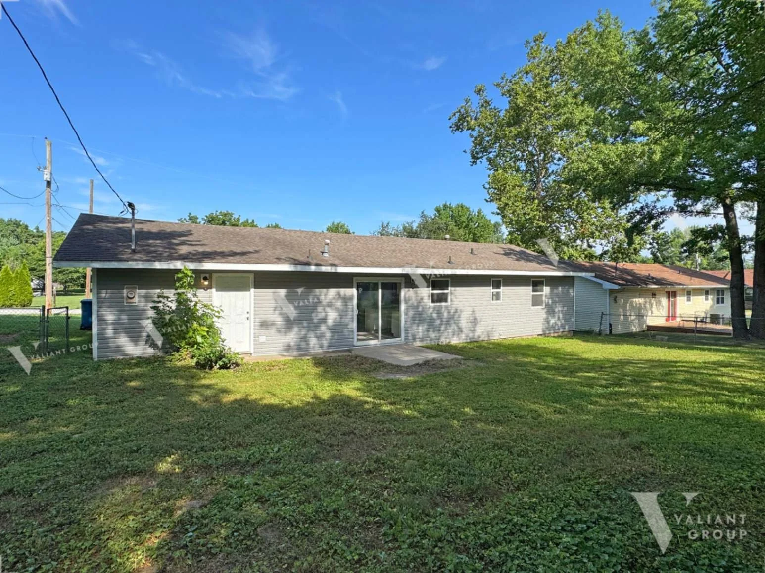 16-304-S-Rice-St-Nixa-back-yard-house-exterior.jpg