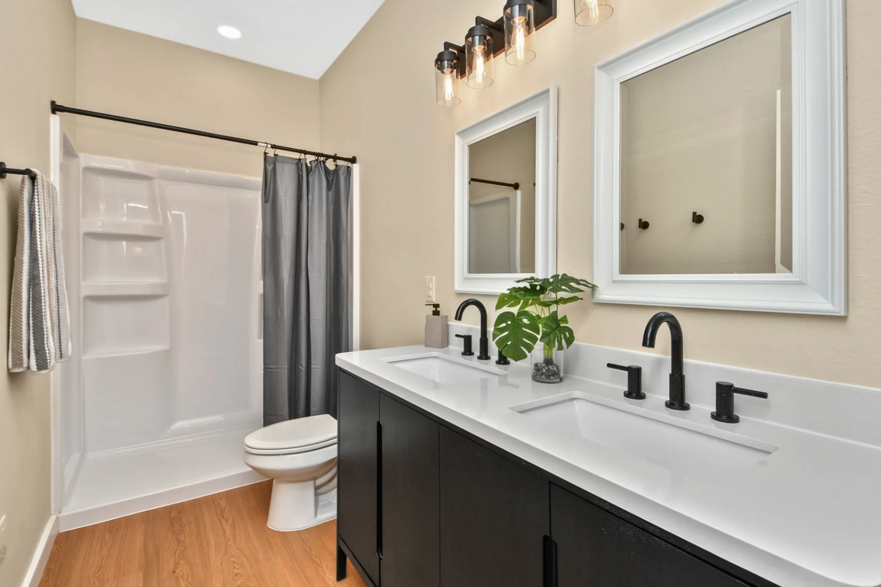 Upstairs Bathroom With Walk-In Shower and Dual Sinks