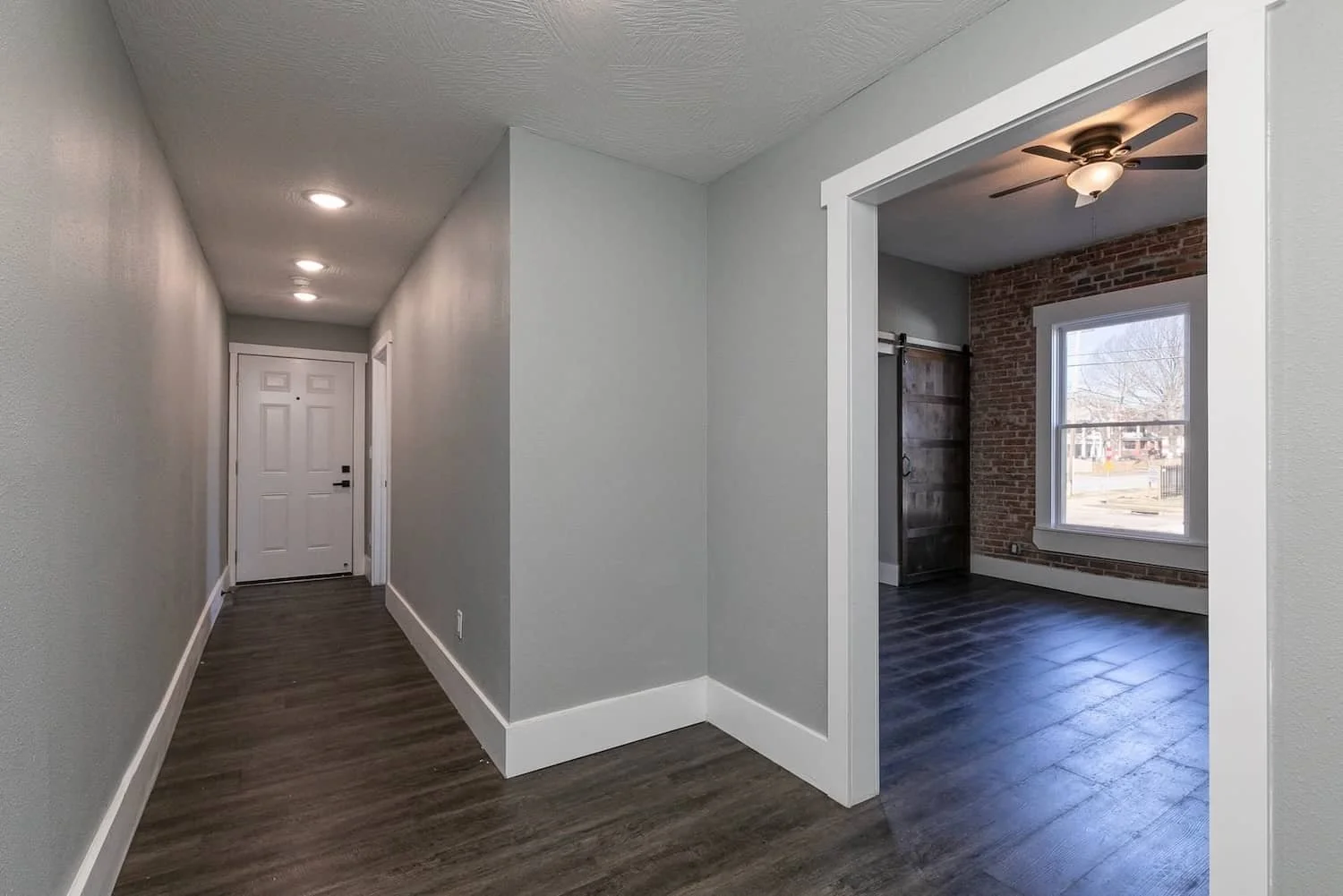 Downtown loft apartment for rent in springfield mo student housing MSU apartment 1 Apt 1 gallery hallway entryway.jpg