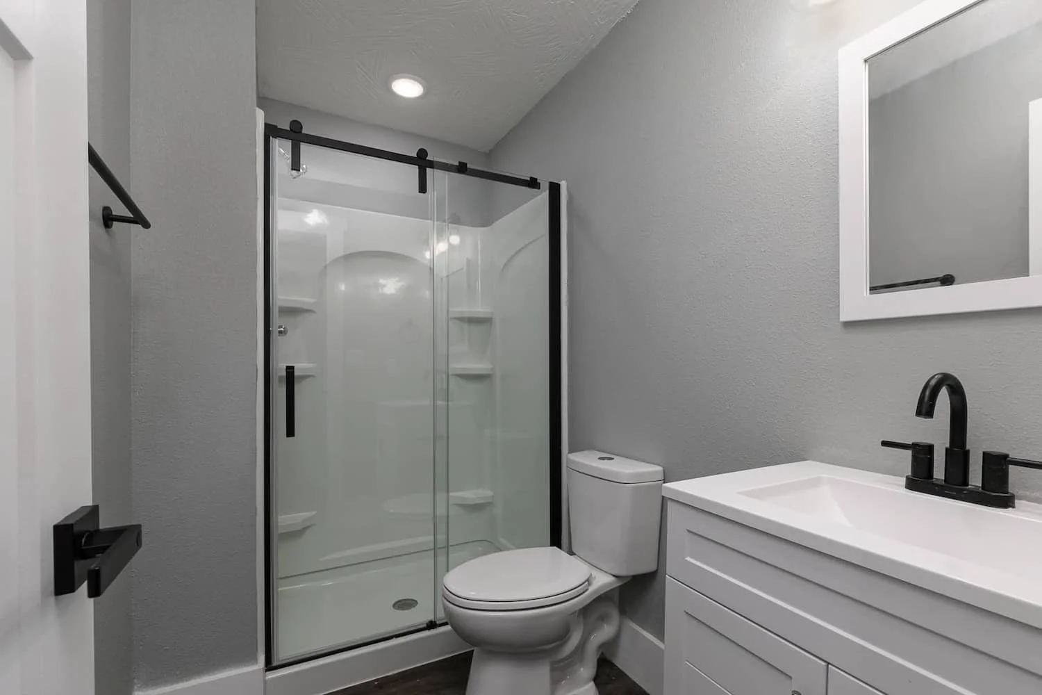 Downtown loft apartment for rent in springfield mo student housing MSU apartment 1 Apt 1 bathroom glass shower.jpg