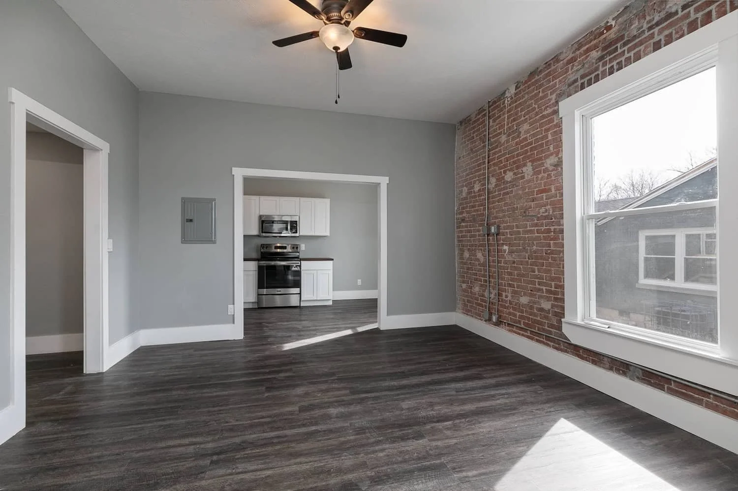 downtown loft apartment for rent in springfield mo apartment 3 living room hardwood floors vaulted ceilings.jpg