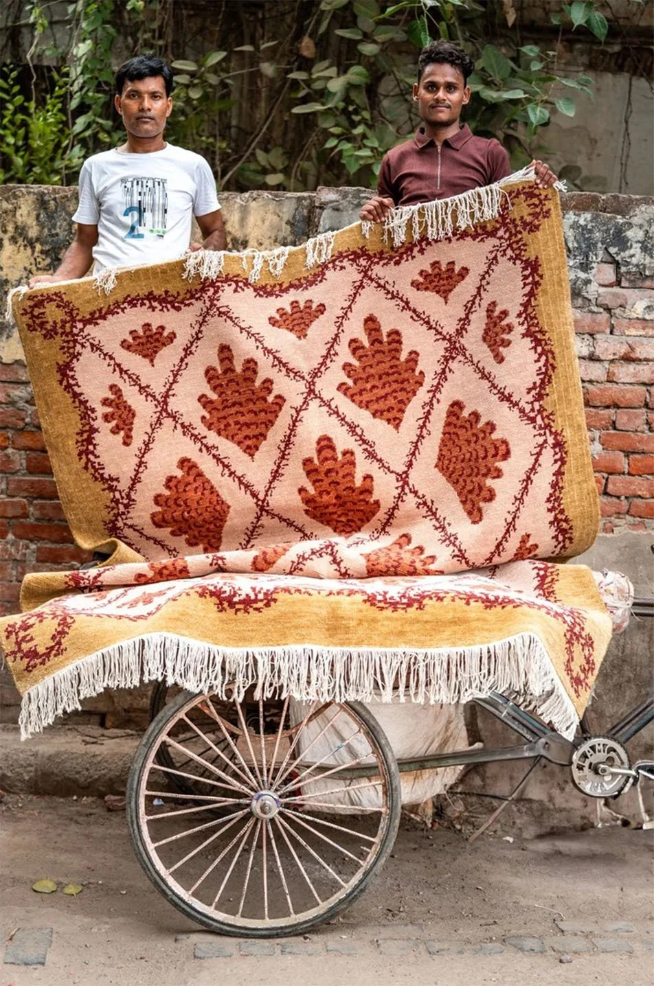 THE MAKERS
The definitive portrait of collaboration. The symmetry and direct gaze of the artisans transform this into a stately representation of master craftsmanship and shared purpose.
