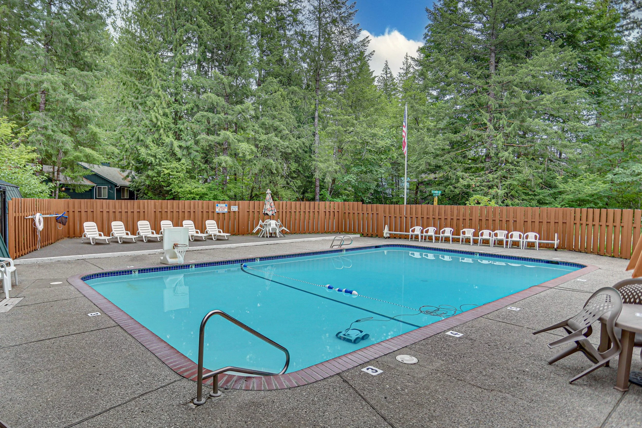 An expansive community pool offers fun for all ages, and a little luxury you might not find at home.