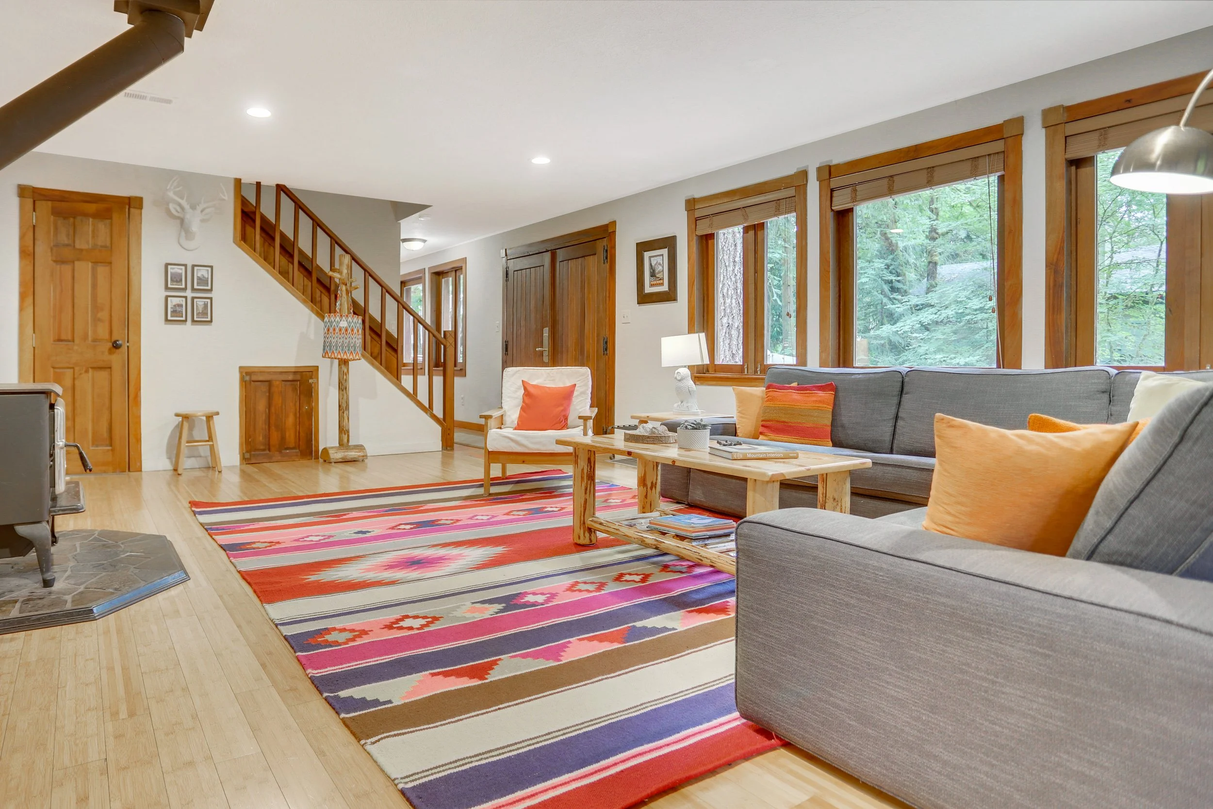 A spacious living room features European design that will accommodate and impress families and large groups.