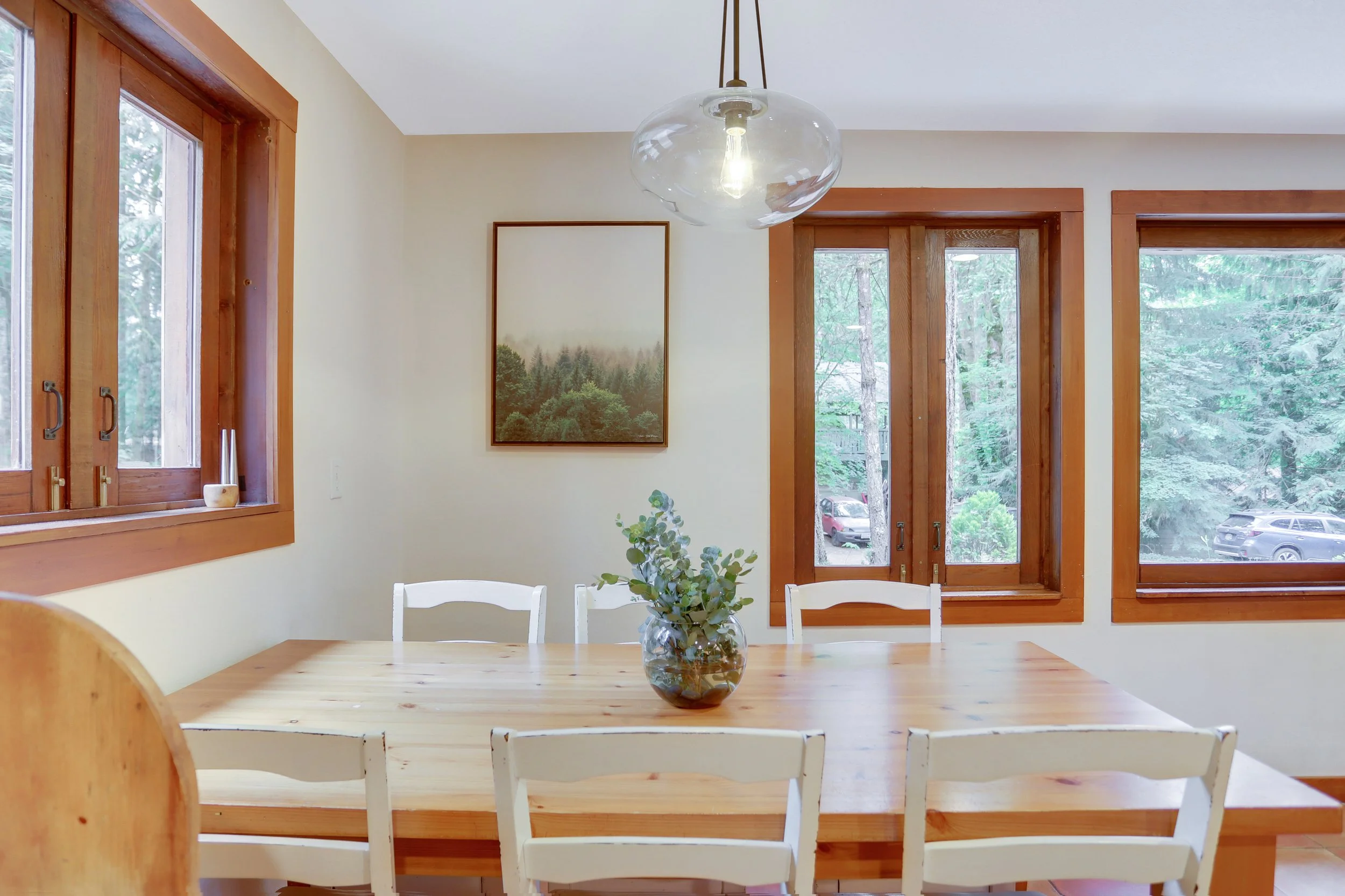 Seat six or more at this dining table for meals surrounded by windows and great company.
