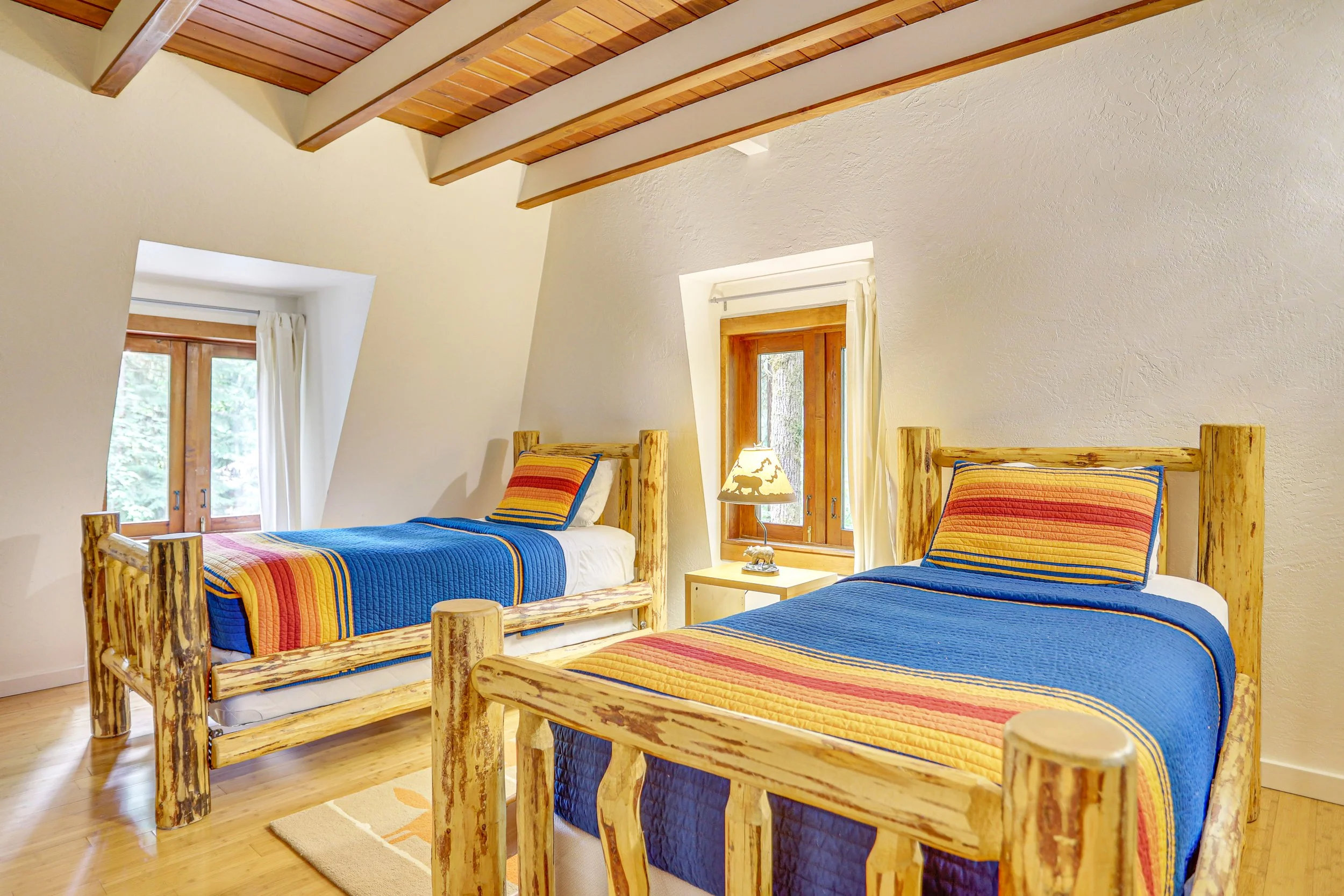 A double twin room with Pendleton bedding, generous windows and a coffered wood ceiling is an especially nice room for kids that adults can also comfortably enjoy.