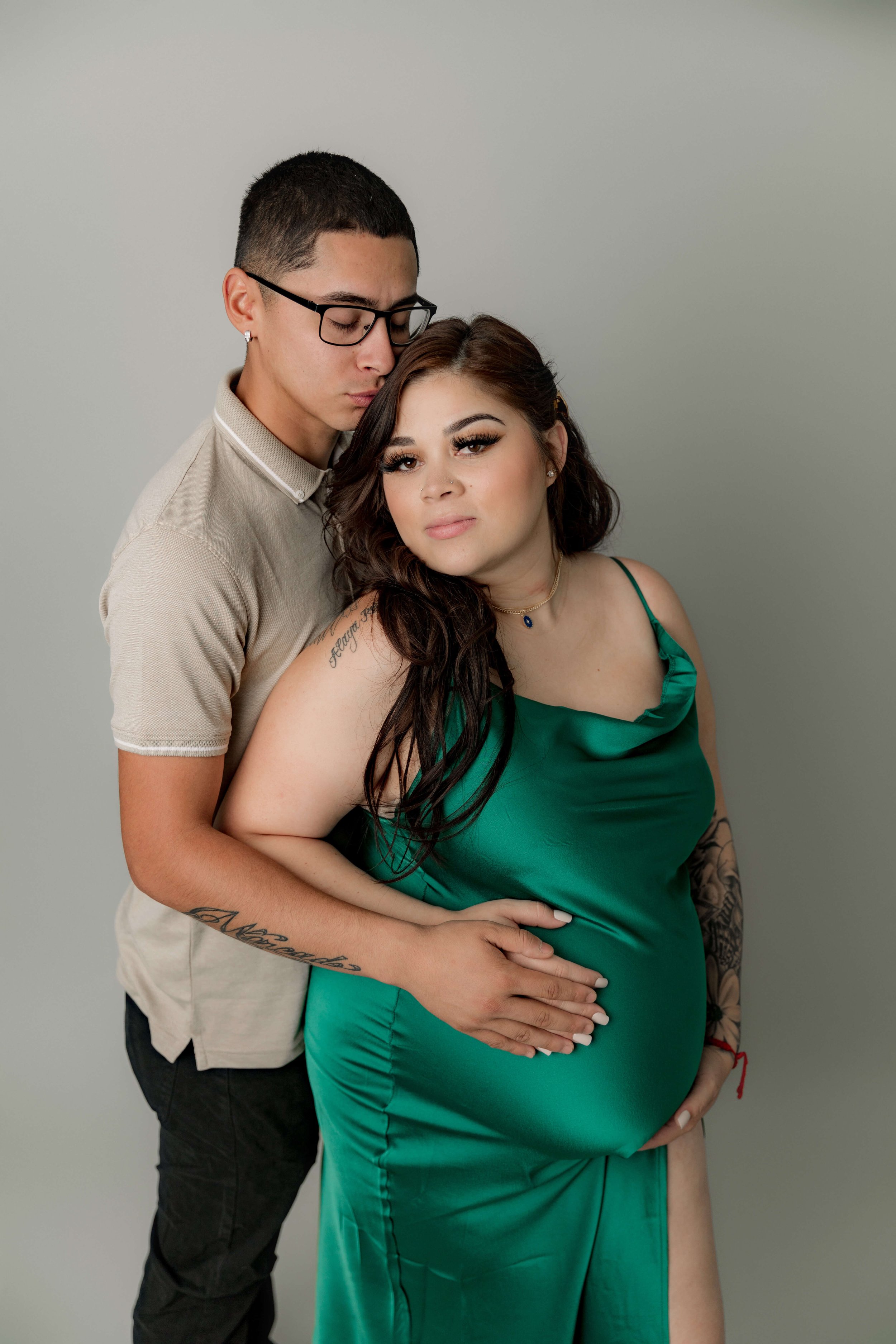 savannah georgia studio maternity photographer posing with spouse