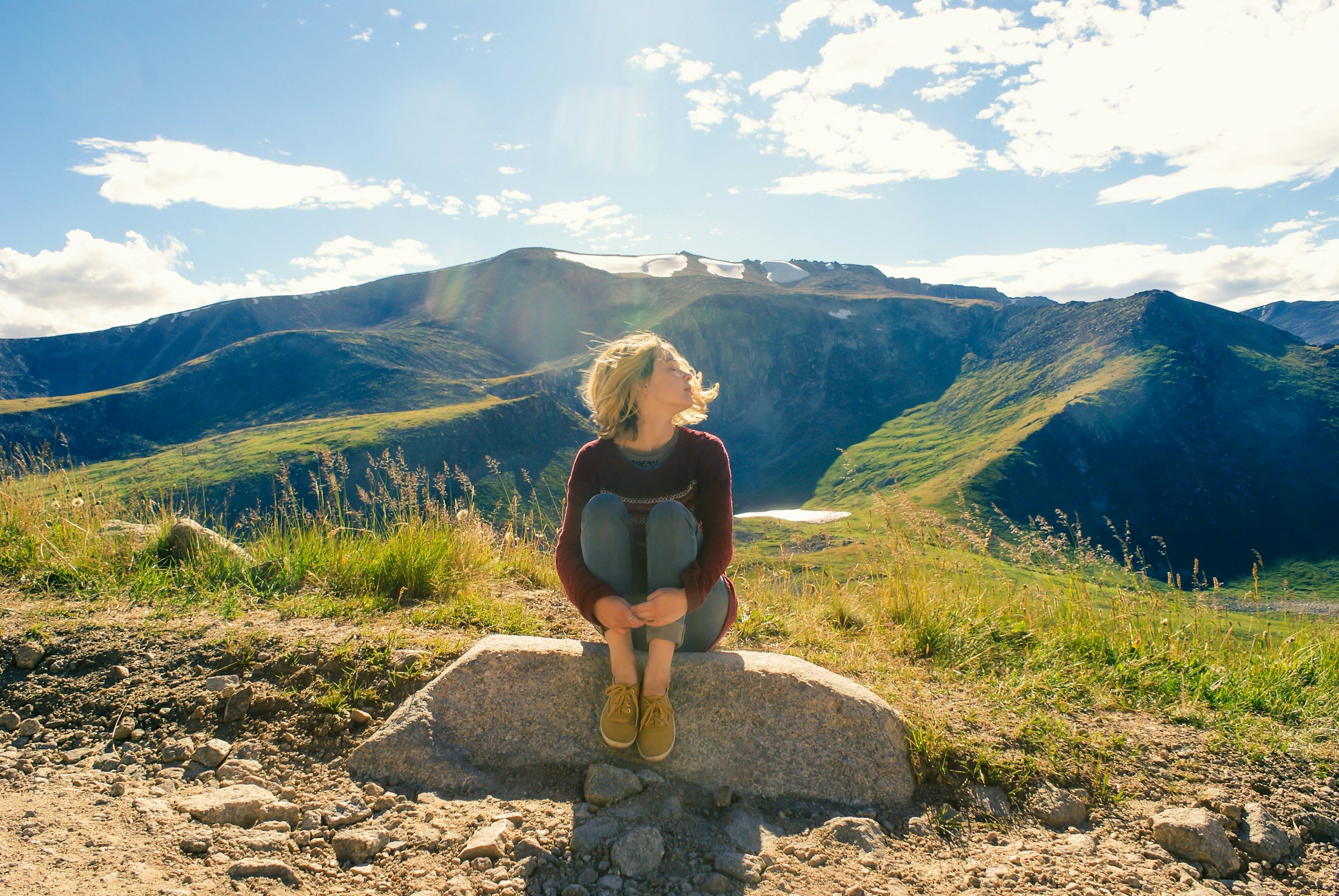 Woman on mountain practicing exposure therapy for panic attacks in Reston, VA
