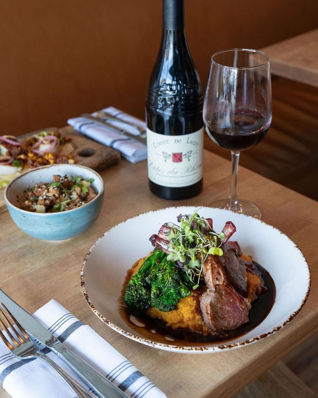 Who's hungry? Perfectly seared lamb chops + a bold bottle of wine = the dinner upgrade you deserve!