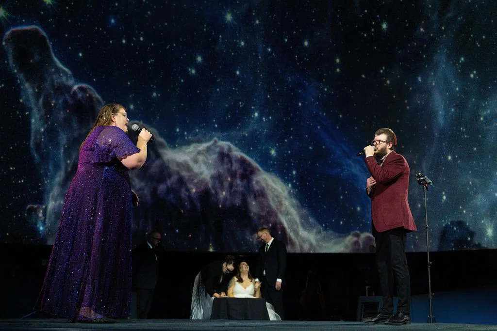 Performing a duet "For Always" by Josh Groban and Lara Fabian 
wedding of Laura and Anthony 2024
Telus World of Science - Edmonton
photo by Aspen Zettle