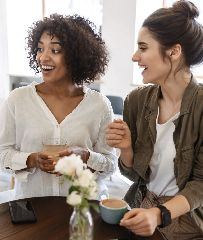 Women in conversation during a supportive moment connected to EMDR intensives