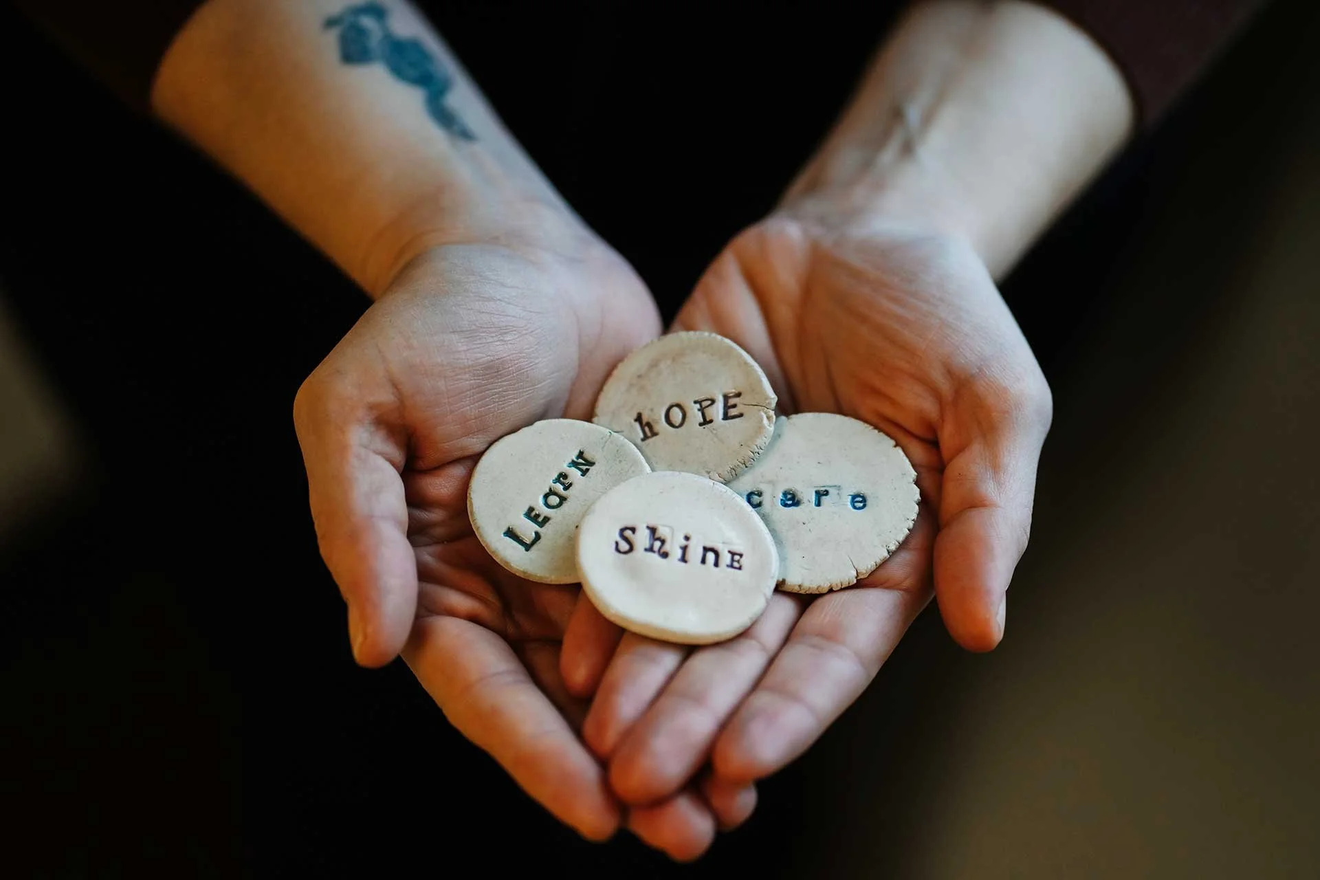 Guiding Kindness Therapy, Bala Cynwyd mental health therapists has a picture of a hand holding words of affirmation such as hope.