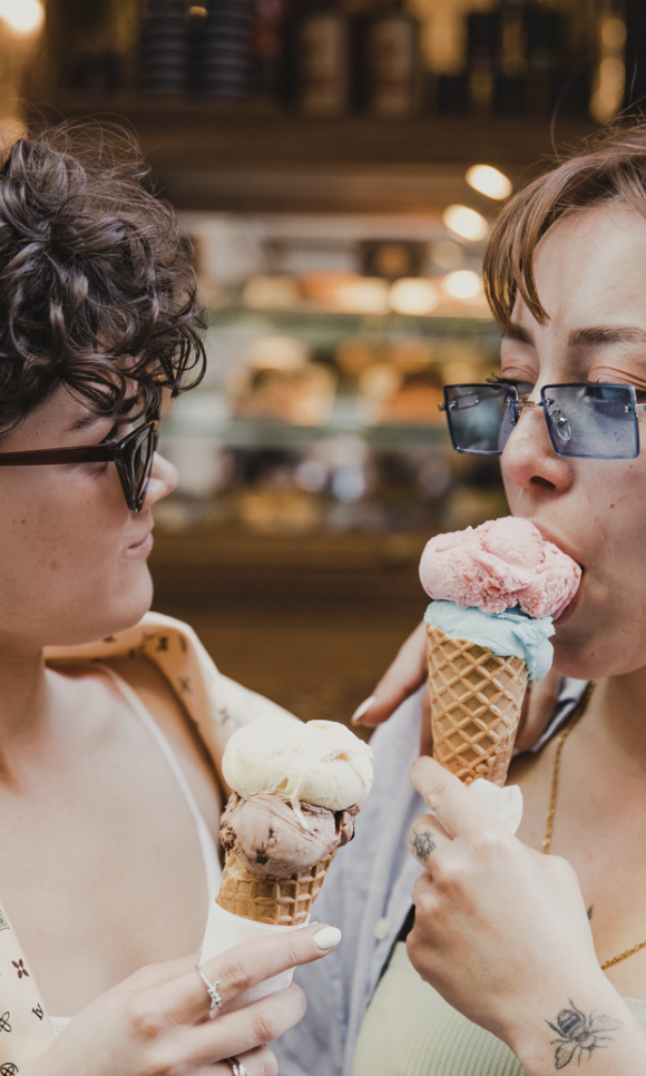 LGBTQ+ therapy that supports identity, connection, and emotional well-being, represented by a queer couple sharing a relaxed, affirming moment together.