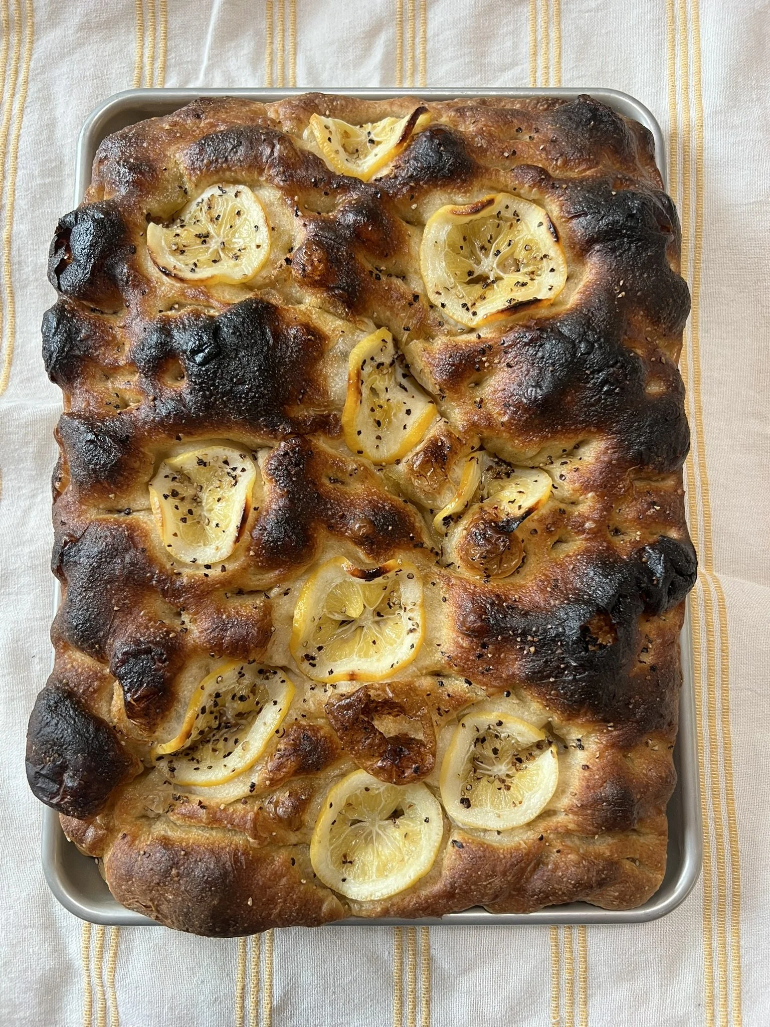 Focaccia Lemon & Pepper (Tuesday only)
Pillowy sourdough flat bread made with wheat and rye flours and organic olive 
oil. Topped with preserved Good Things Farm lemons and black pepper. 
Available whole or half.