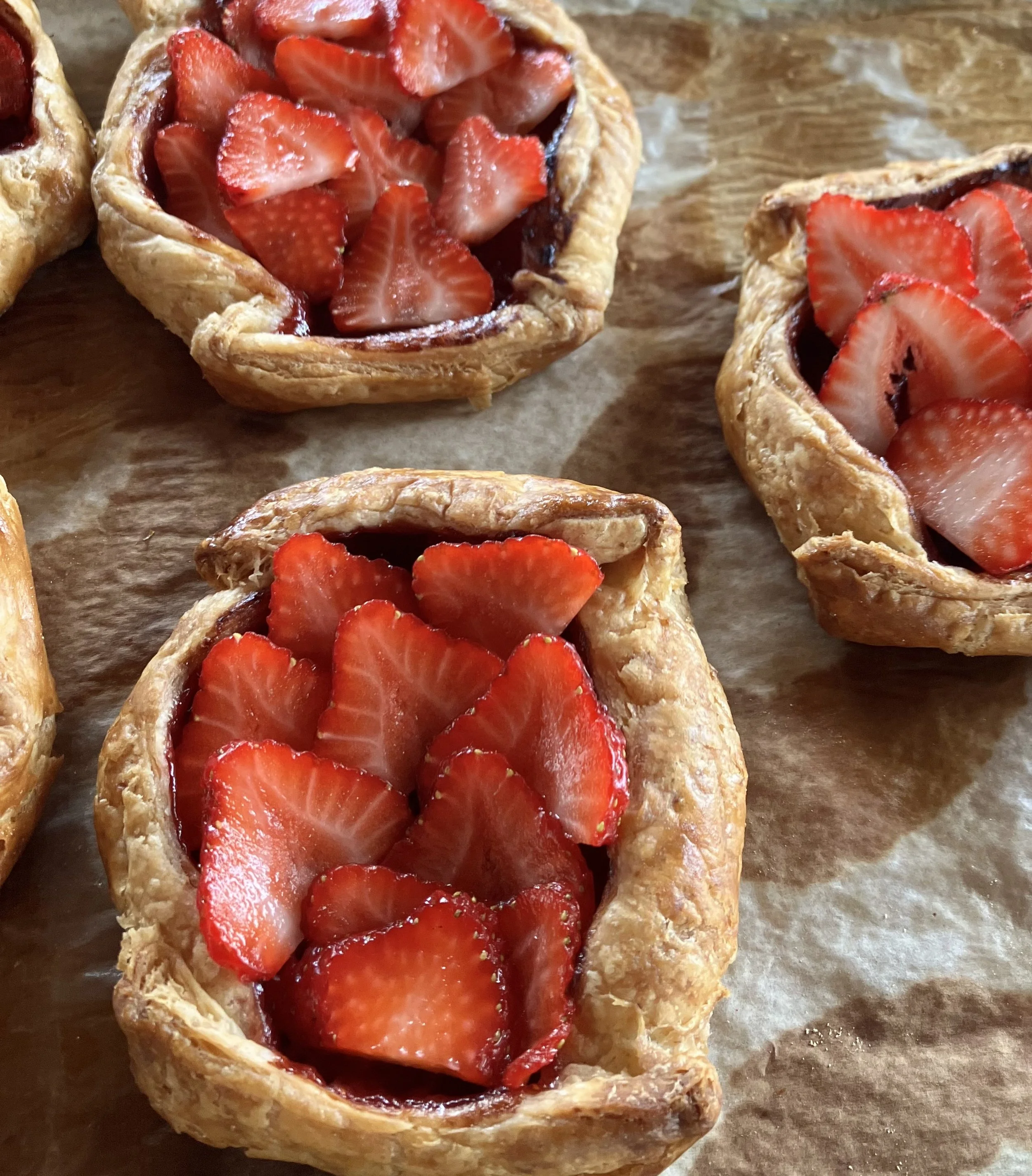 Strawberry Galette (Tuesday only)
All butter rough puff pastry dough filled with strawberry jam and fresh 
Mist Farm strawberries.