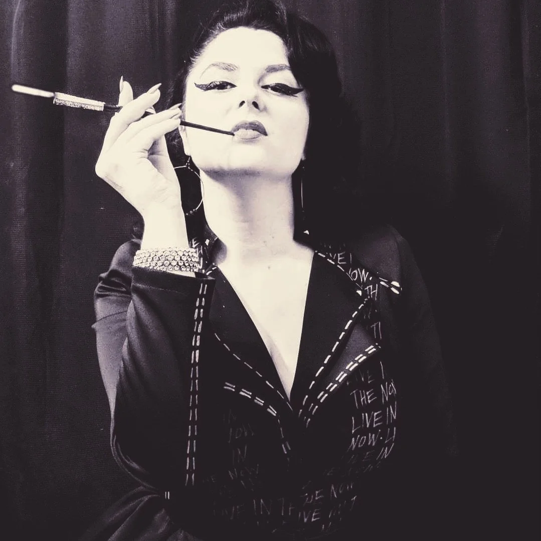Alecia Di Quattro in black and white image with 1950's rockabilly punk rock vibe.
