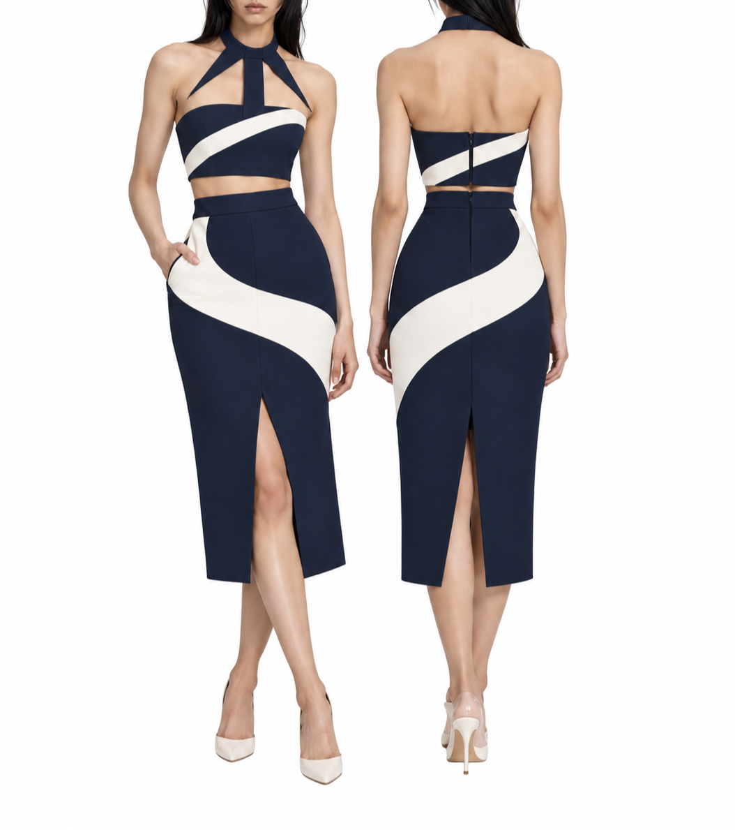 A woman modeling a navy blue and white two-piece dress with a slit in the skirt, shown from both front and back views. The dress features a high neckline, cutouts, and a zipper at the back.