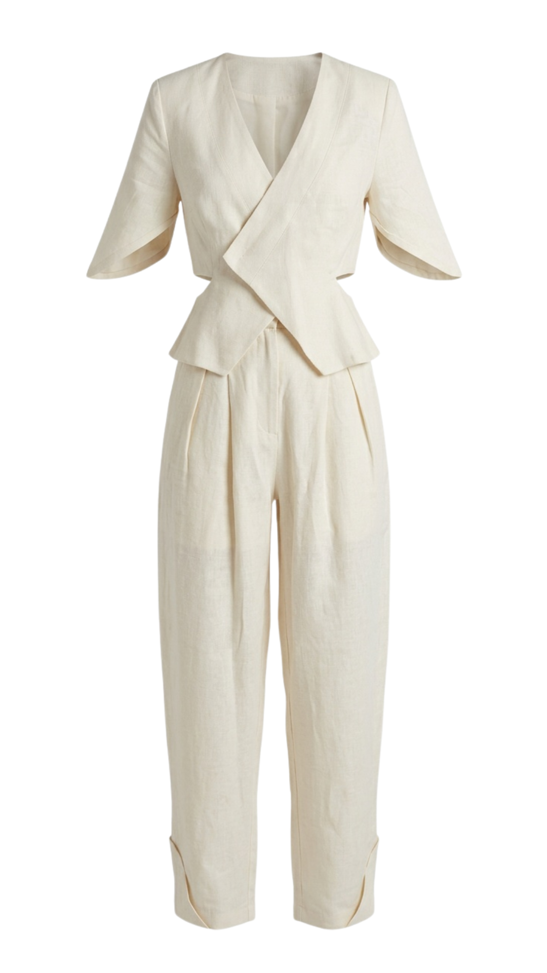 Cream-colored tailored pant suit with a wrap-style jacket and high-waisted, pleated trousers.