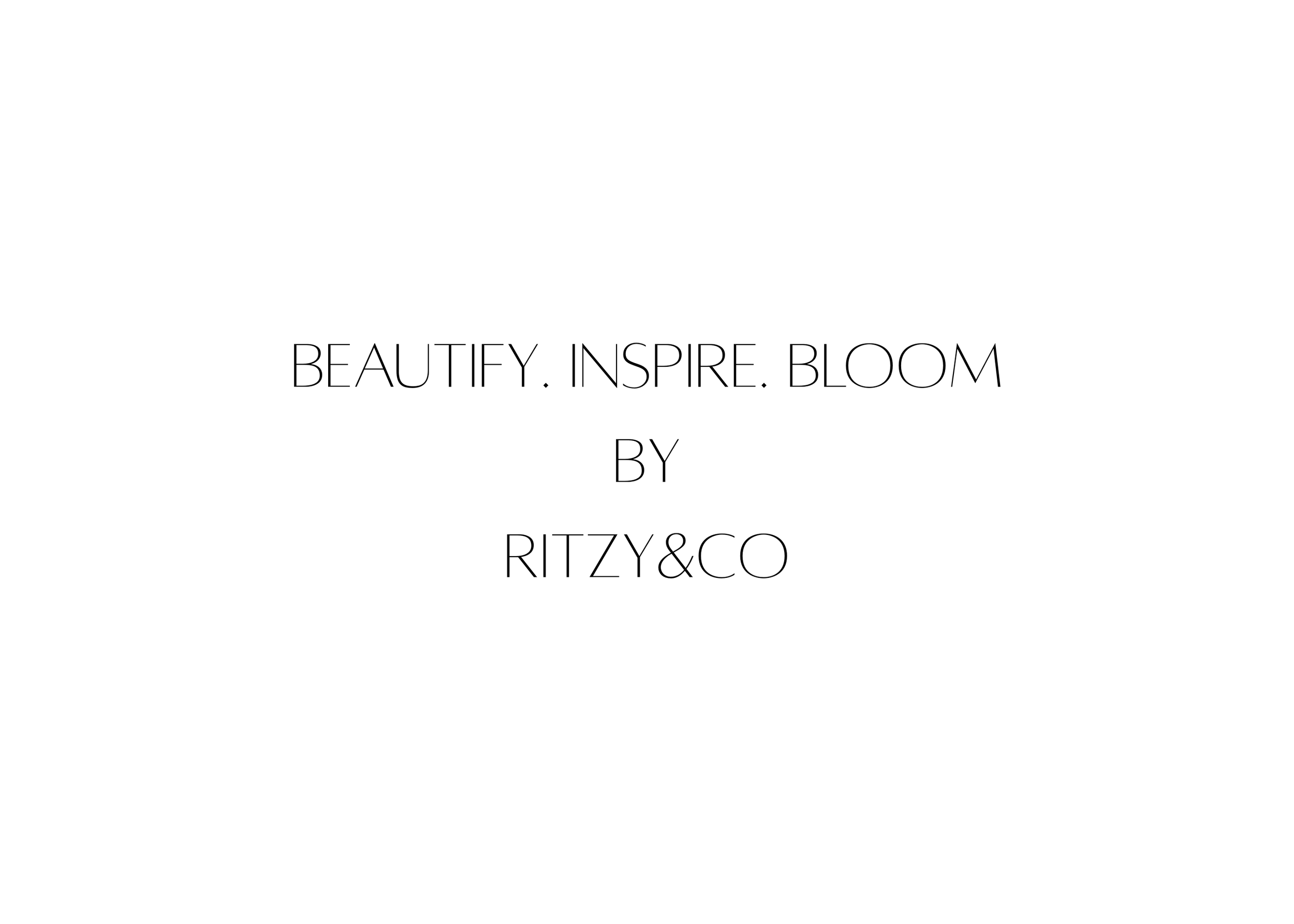 Text on a white background that says, 'BEAUTIFY. INSPIRE. BLOOM BY RITZY&CO' in black, elegant font.