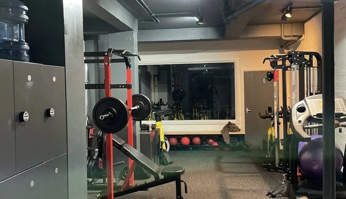 Inside JD Fitness Studio, a private gym in Camden, featuring strength training and weightlifting equipment