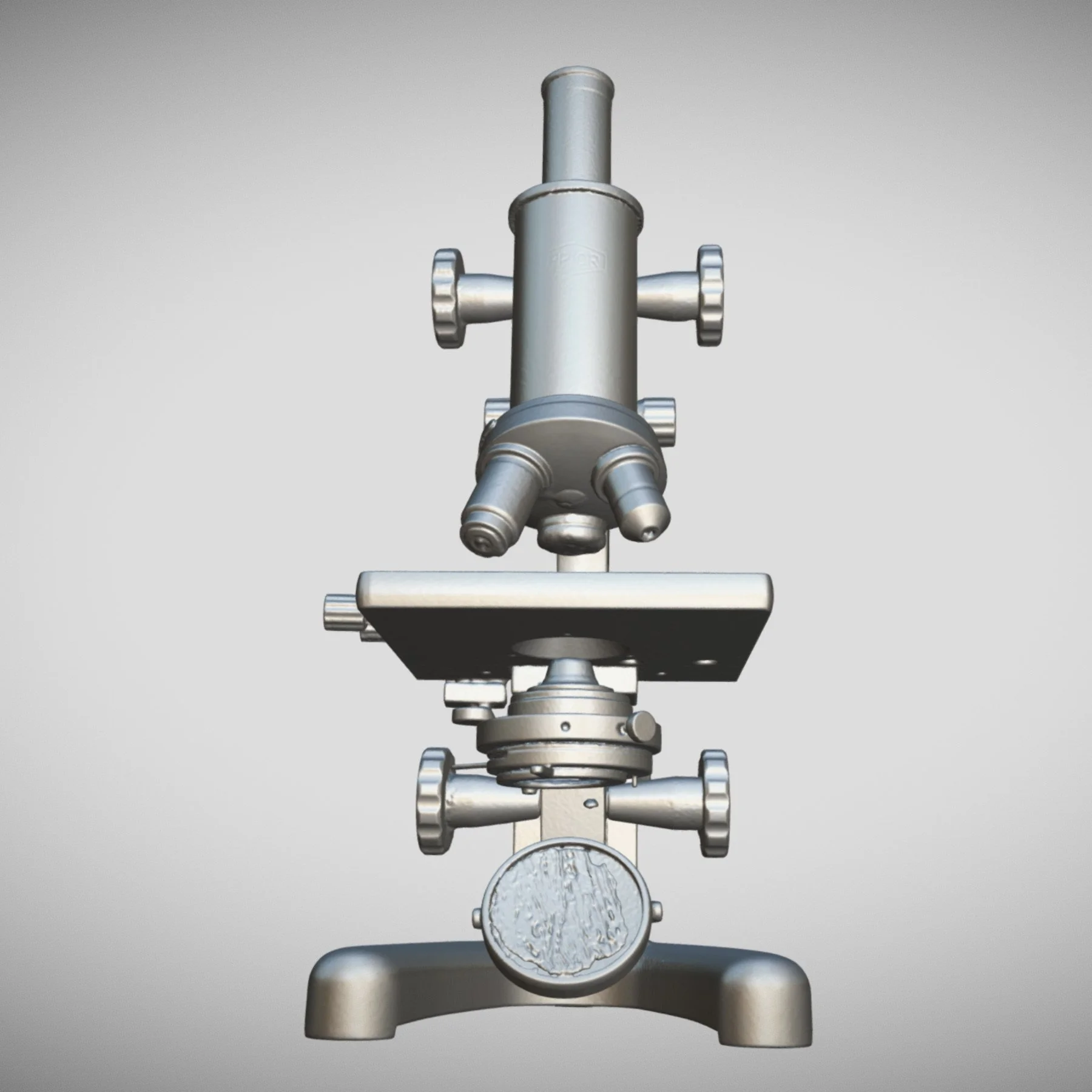 A silver compound light microscope with multiple adjustment knobs and a circular stage, set against a plain background.