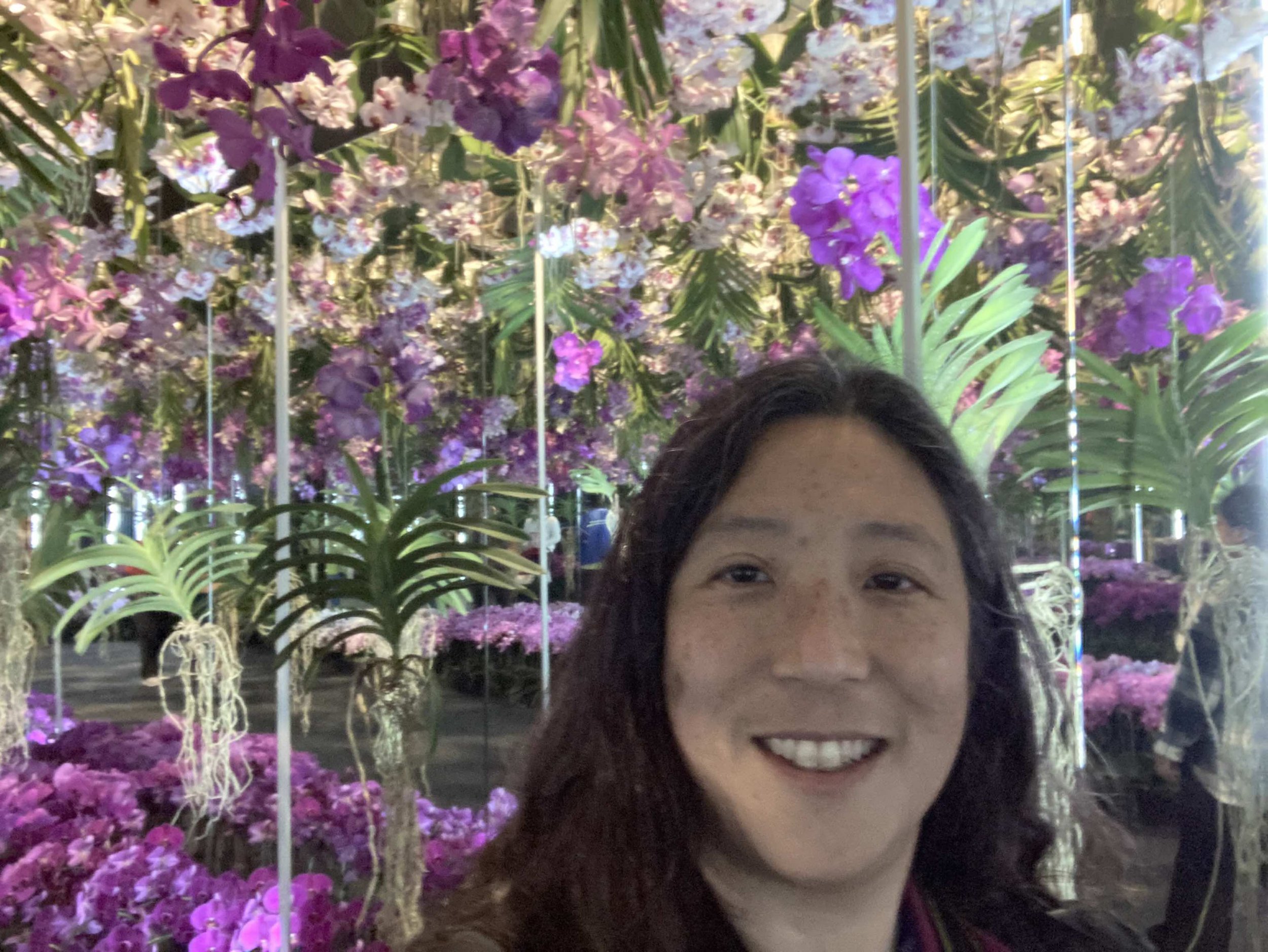 Kay with Orchids.jpg