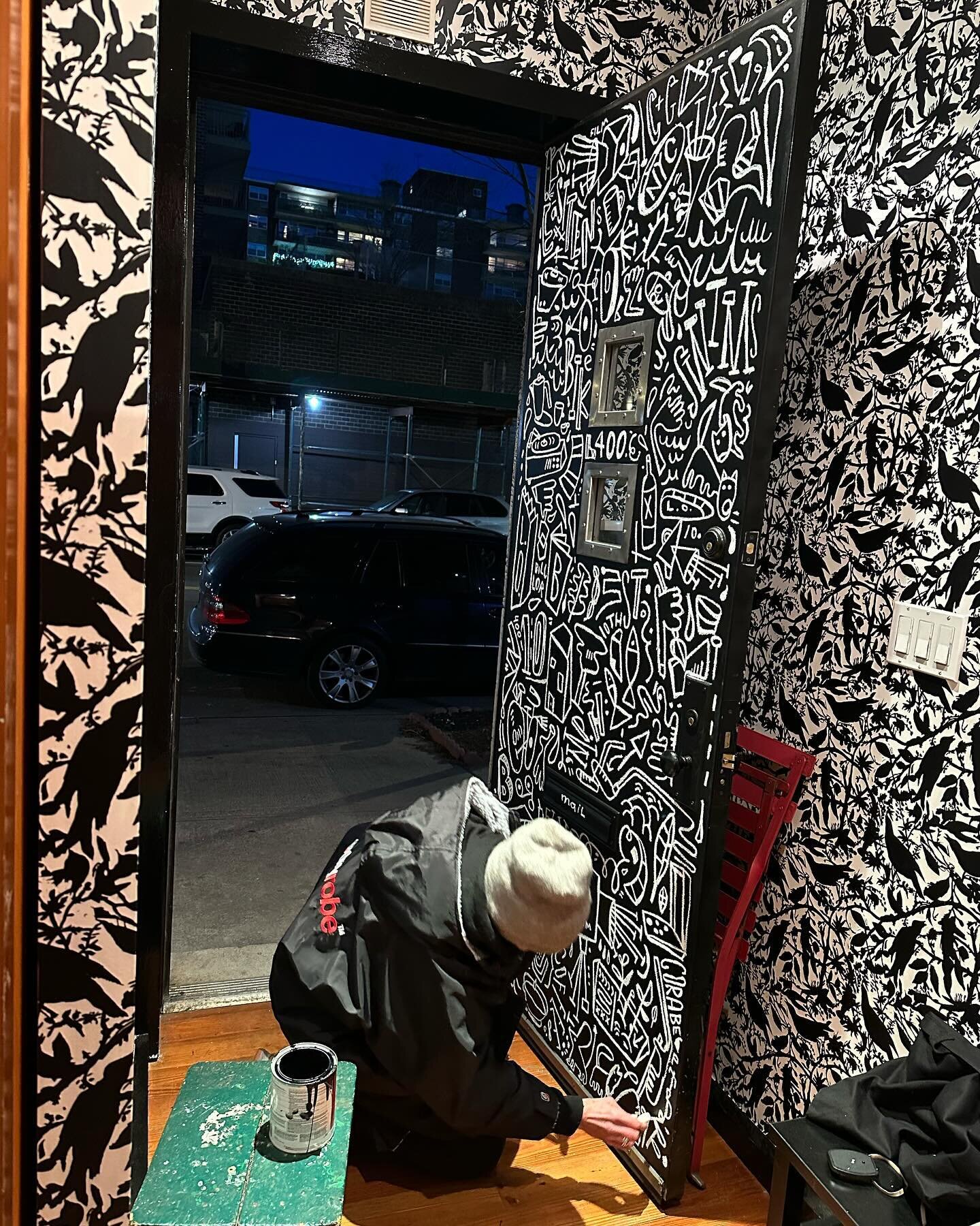 Front door for laurie and bill on east tenth street with curly helping.  Wallpaper by @laurieolindertextiledesign 

#eastvillage  @bimo65 @laur400  love working with and for my pal.