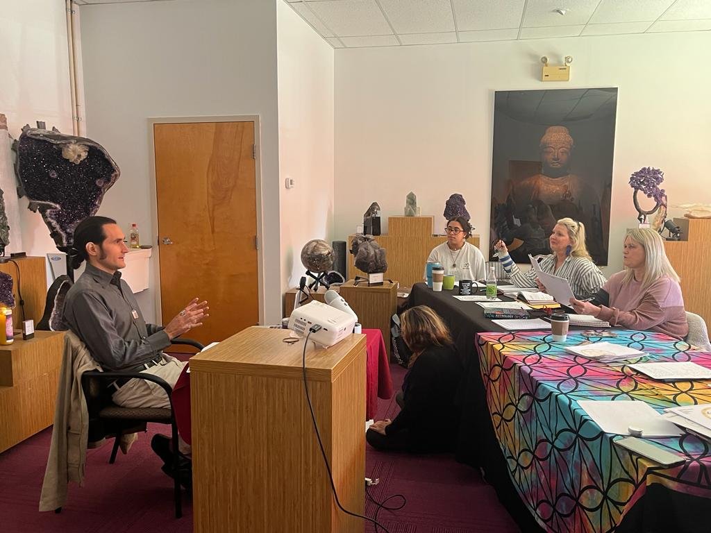 photo of a class in the Aquarian classroom, Nick Lasky instructing attendees with a projector
