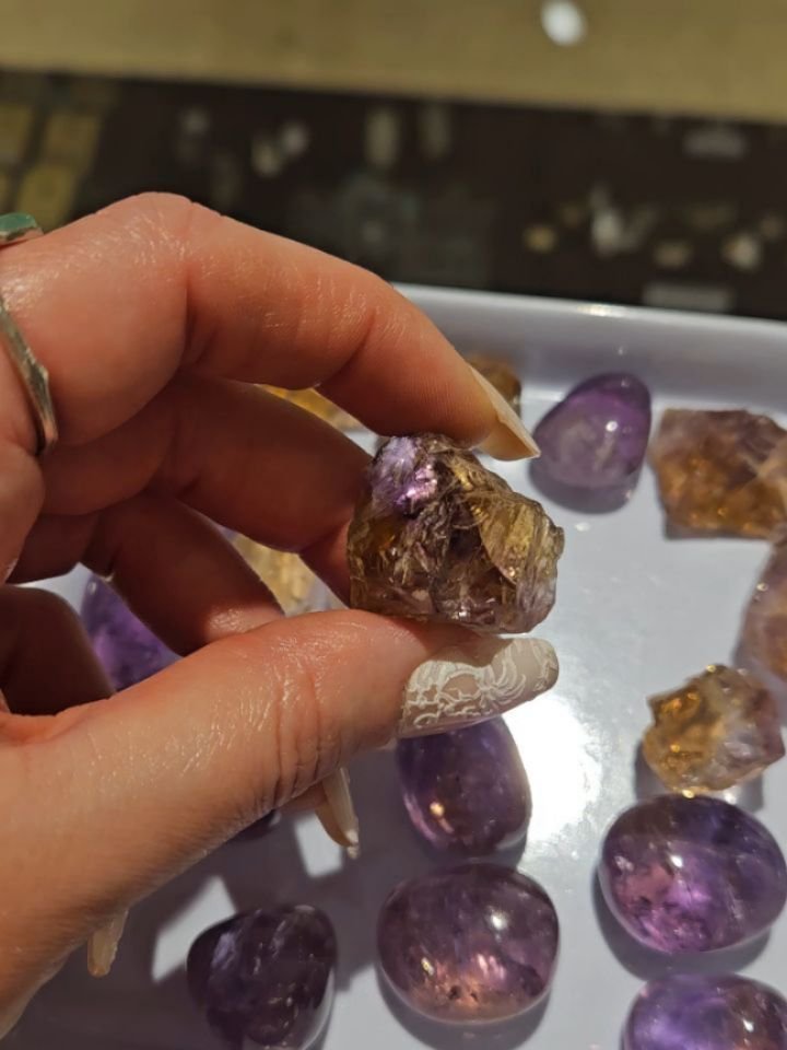 &quot;Ametrine is a harmonious blend of Amethyst and Citrine energies.  Amethyst is stimulating to the crown chakra, protective to one's auric field, purifying to one's personal energies and uplifting to the spirit. It can aid greatly in letting go o