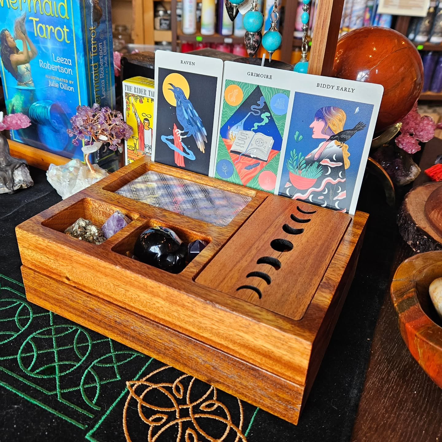 New Tarot Card Boxes in-store! ✨️

These nifty boxes have compartments for all your tools of divination and even have a slot to hold your cards upright! 

#aquarianbookshop #rvacrystalshop #divination #tarotcards #rva