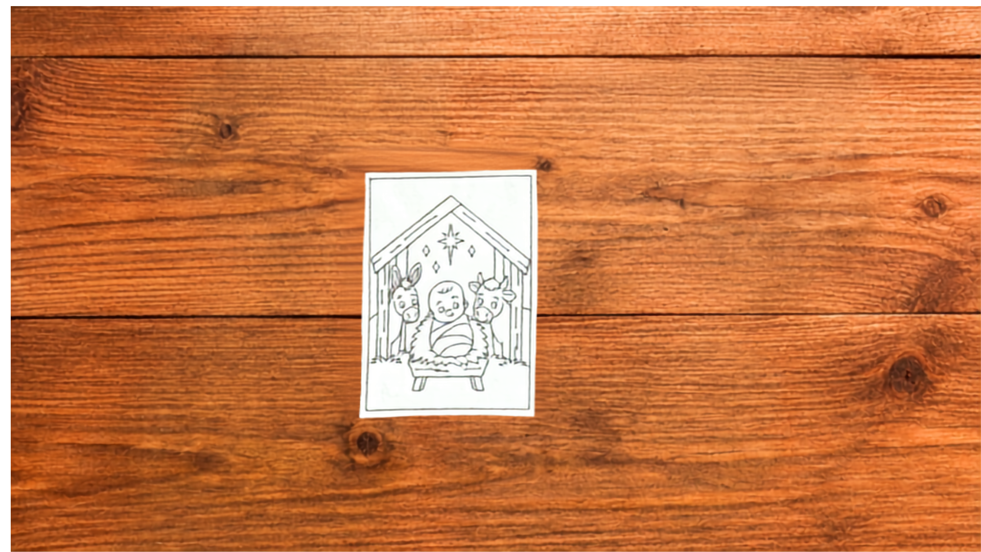 Empty Nativity reusable Bible Coloring Cutie activity card on wooden background