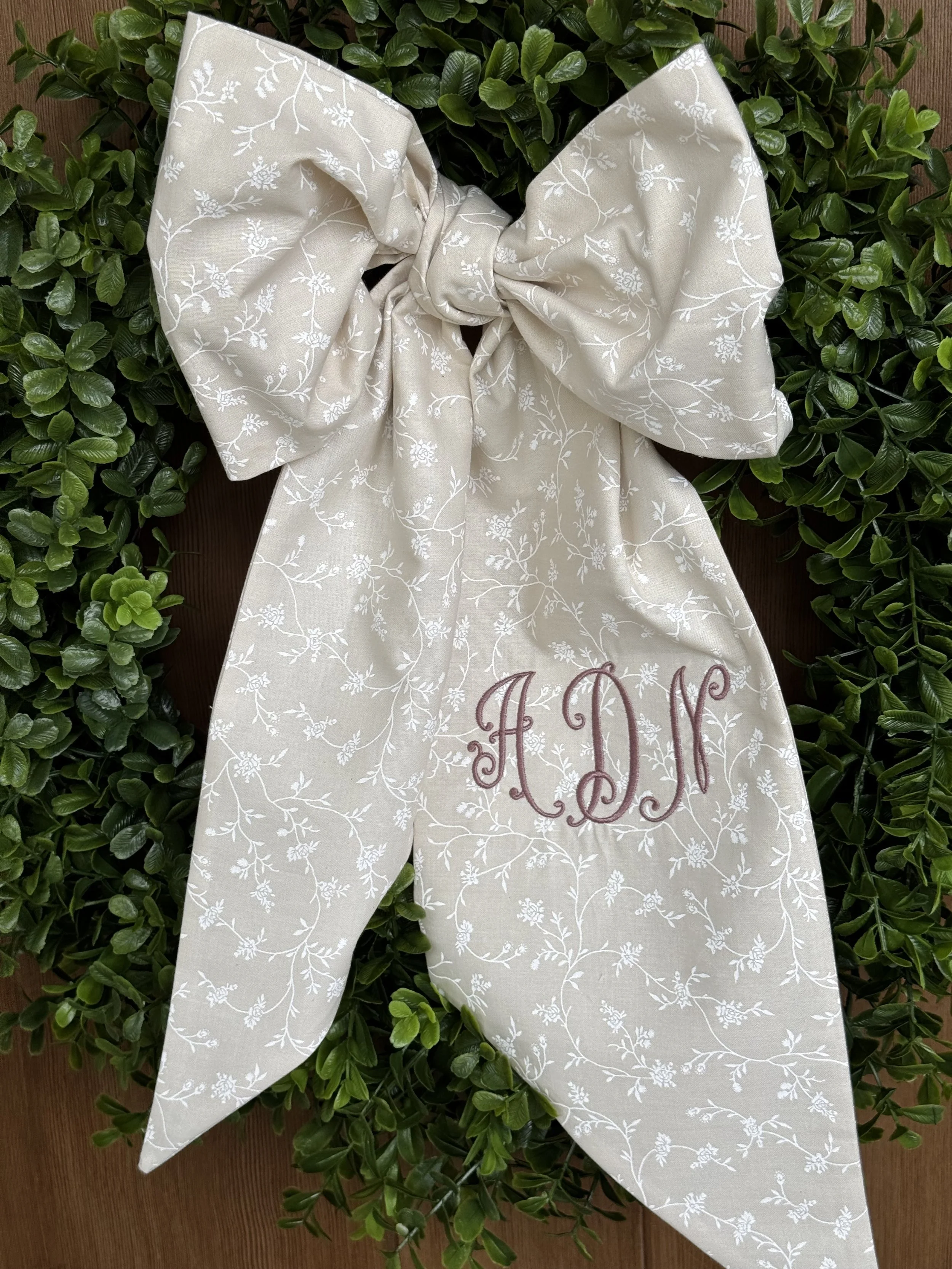 Handmade neutral floral wreath bow personalized with an embroidered monogram. (Copy)