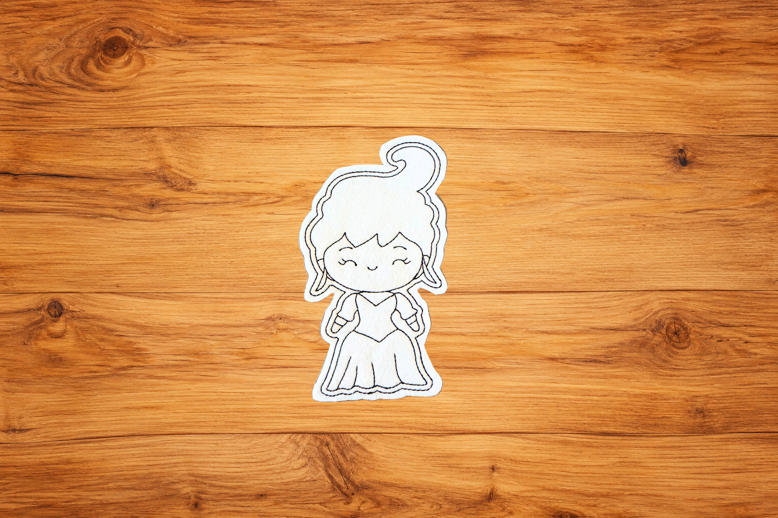 Witchy Woman 3.pngHandmade Witchy Woman Coloring Cutie with high curled hairstyle and embroidered outlines on a warm wood background
