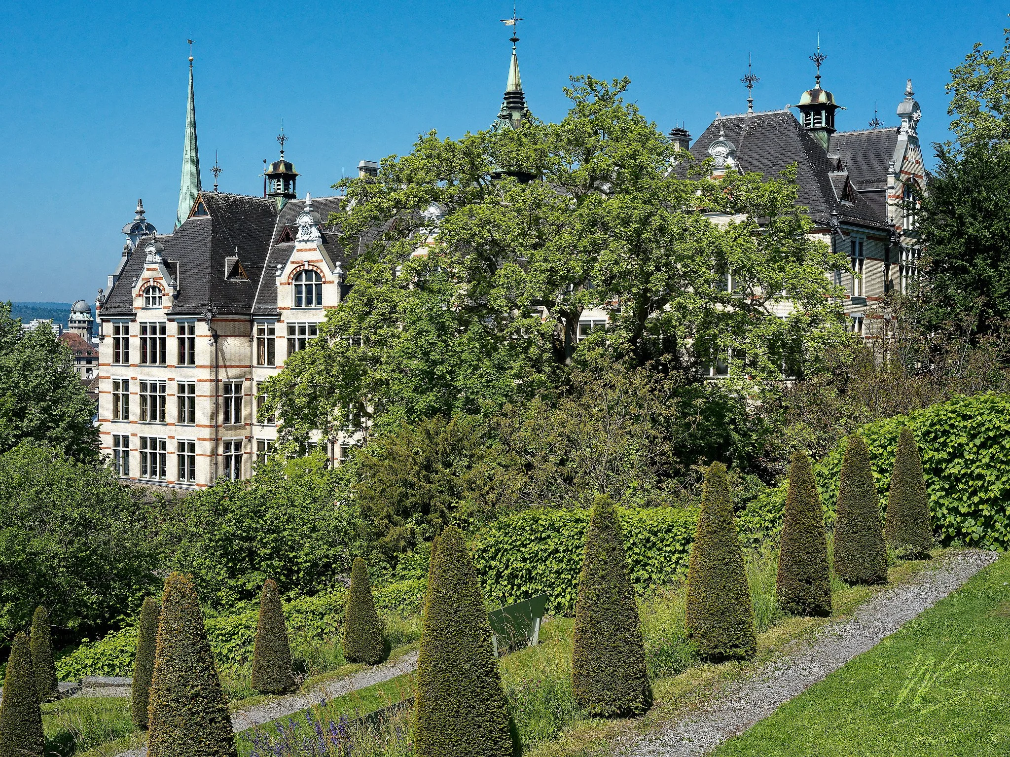 The University of Zurich (Universität Zürich) main building, designed by Karl Moser and completed in 1914, viewed from the terraced gardens above Rämistrasse, Zurich, Switzerland. One of the largest universities in the German-speaking world, the neo-