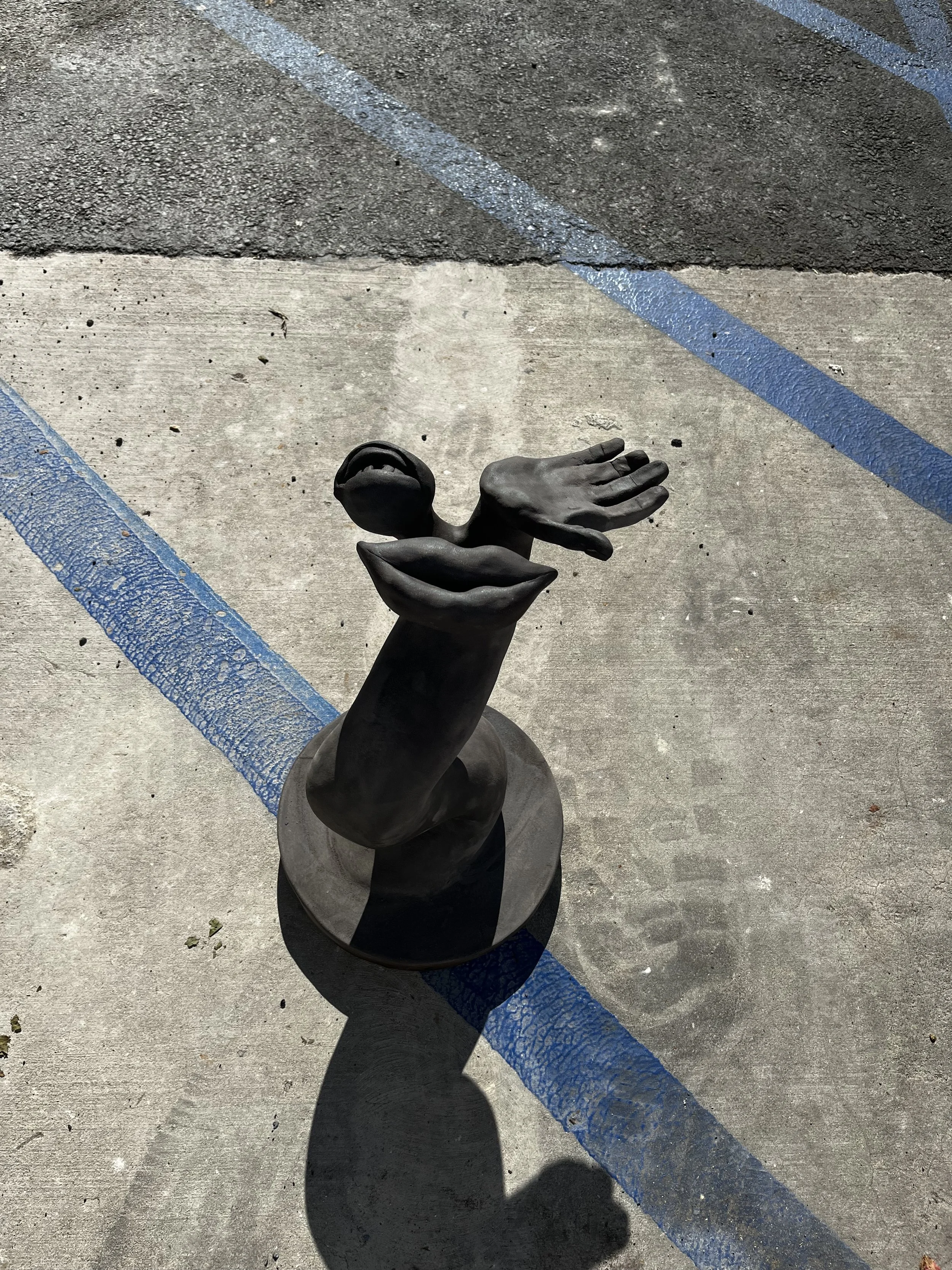 Hand-Built ceramic sculpture. Photographed in natural light.