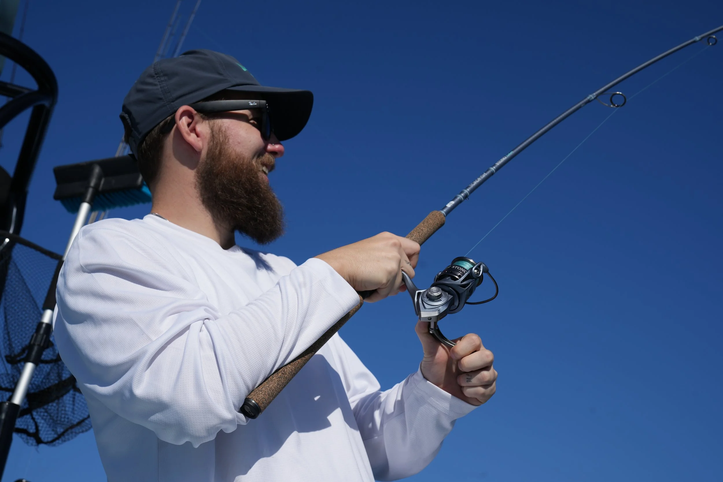 JC Fishin Charter client hooked up to redfish