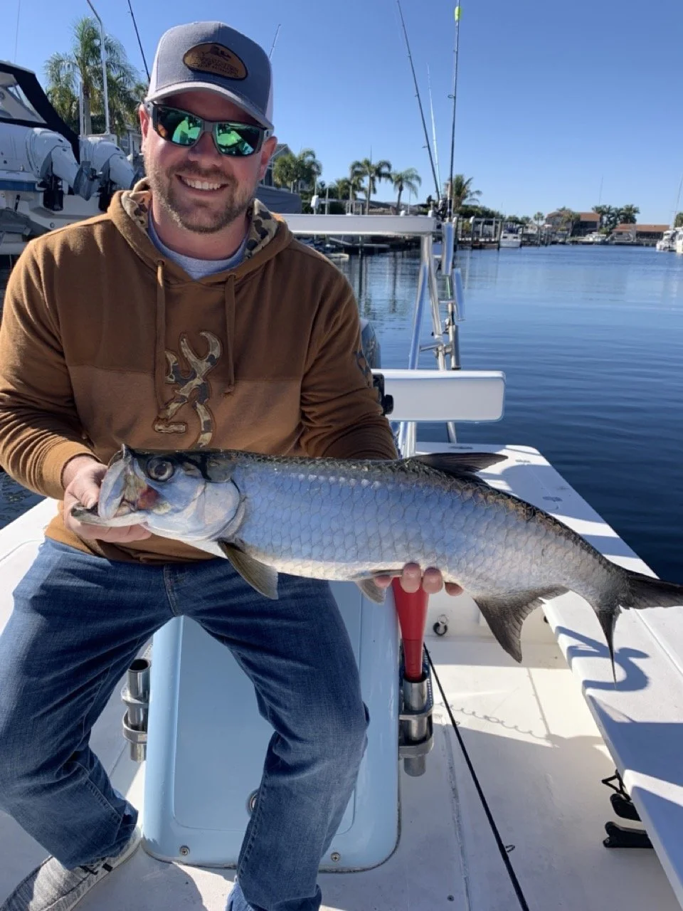 Cody with his first Tarpon on an Inshore Fishing Charter with Captain Jason Cochran with JC Fishin Charters out of New Port Richey, Florida Pasco County