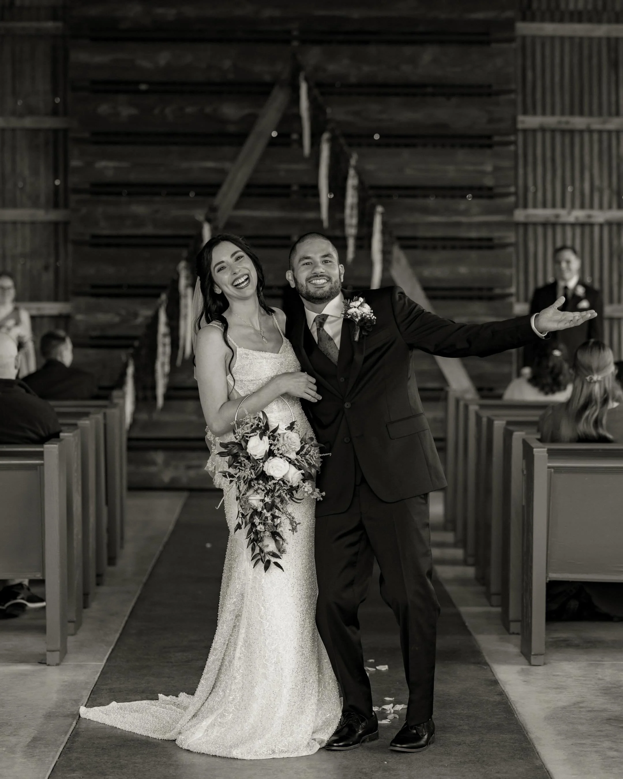 Oliviann x Curran
-
Some weddings are filled with sunshine, but this one proved that gloomy skies can still make for the most beautiful kind of day!

One year after officially tying the knot, these two finally got to celebrate surrounded by the peopl