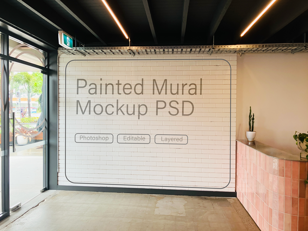 Indoor brick wall mockup for posters, murals, campaigns or large-scale artwork.
