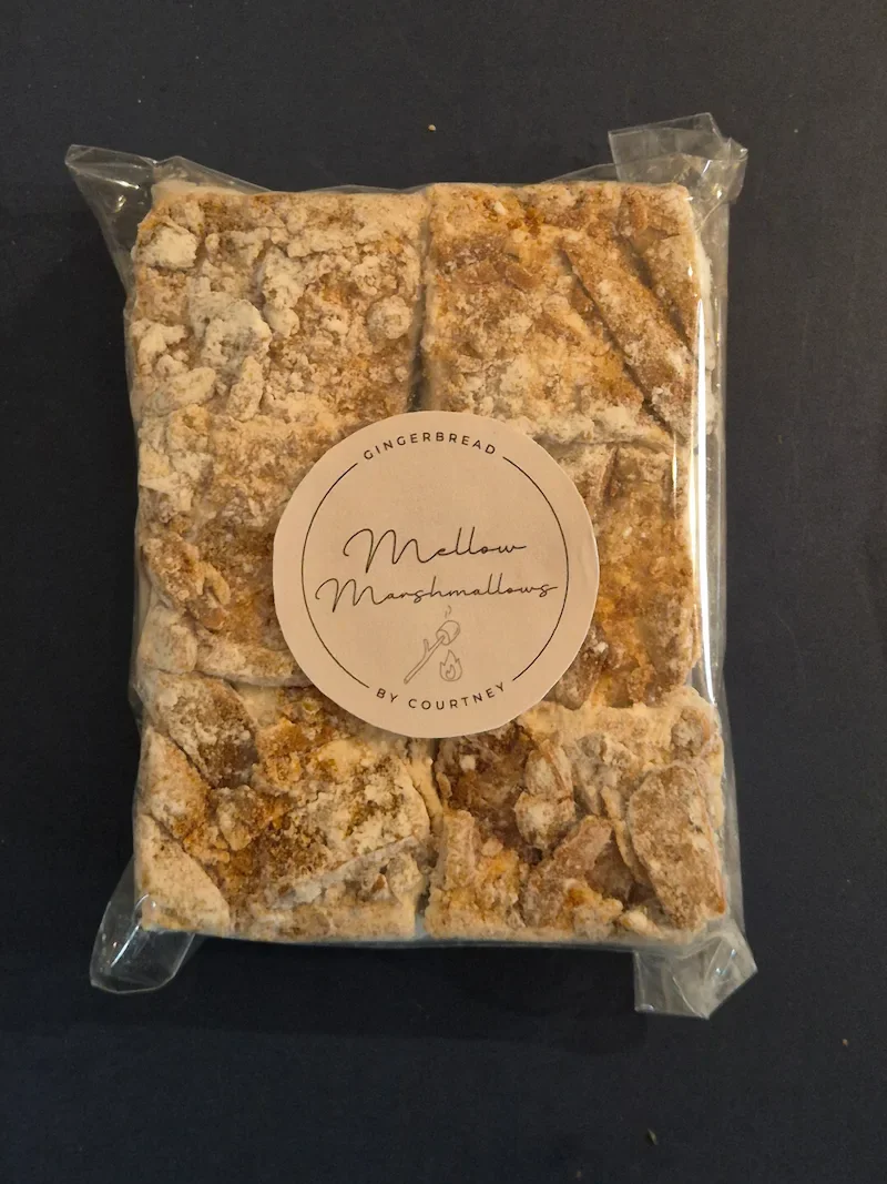 Sugar-free gingerbread marshmallows in a clear cellophane bag tied with ribbon, a festive homemade Christmas gift idea for women’s wellness.