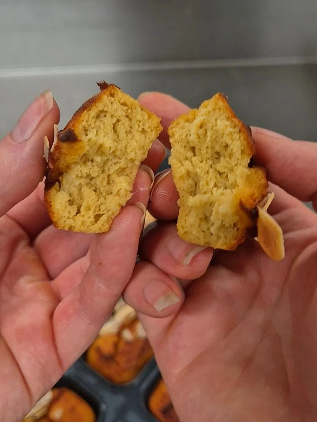 Close-up of a moist, refined sugar-free orange and almond cake slice. Rich in fibre, vitamin C and warming ginger for hormone and digestive support.