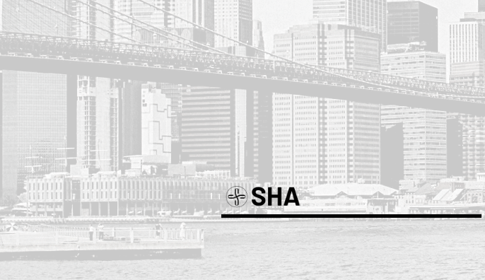 Black and white photograph of a cityscape with tall skyscrapers and a bridge over a river.