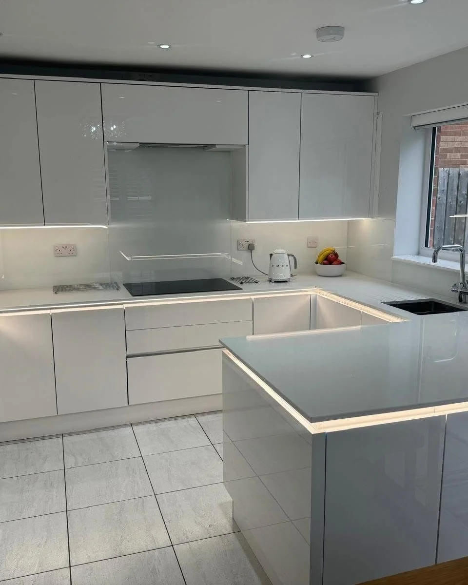 gloss white kitchen under worktop lighting undermount sink quartz worktop