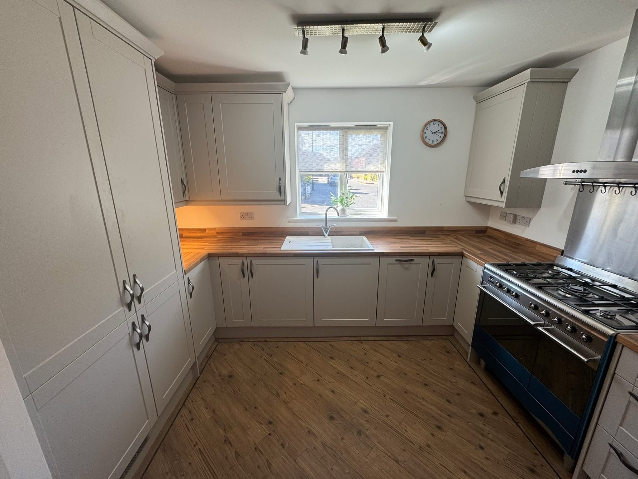 light grey shaker kitchen oak block worktop white sink  freestanding oven in gateshead