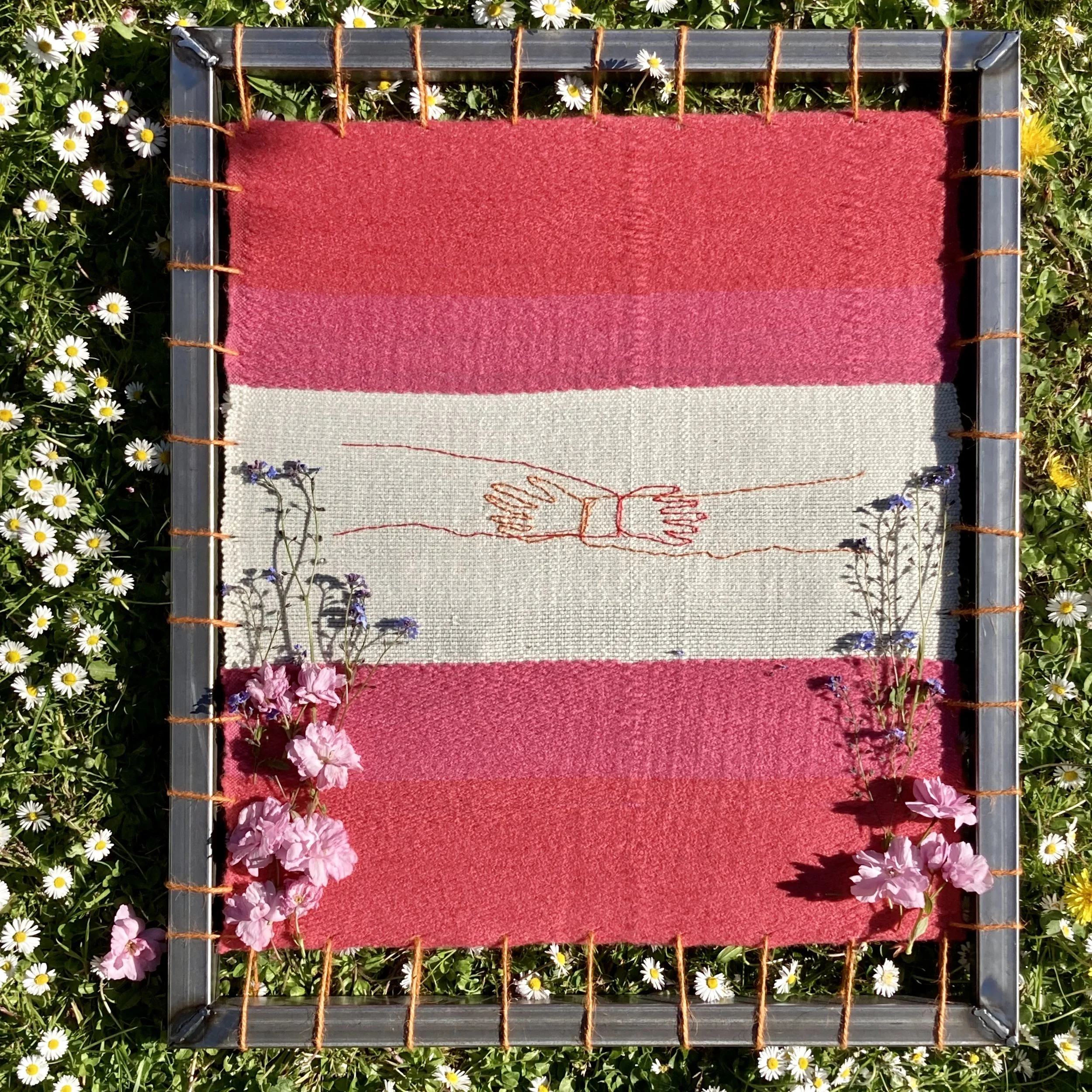 woven and embroidered piece in metal welded frame 